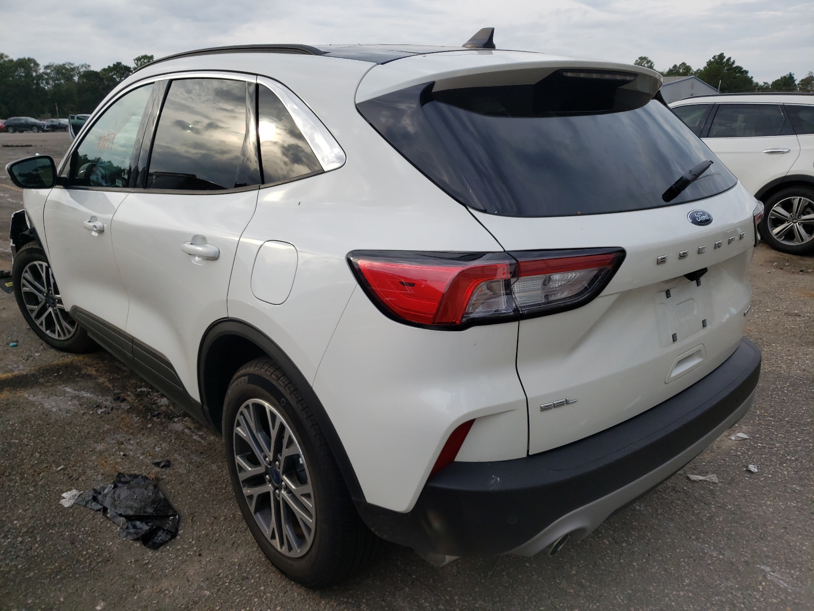 Photo 3 from auction – 2021 FORD ESCAPE SEL with VIN 1FMCU9H65MUA70585