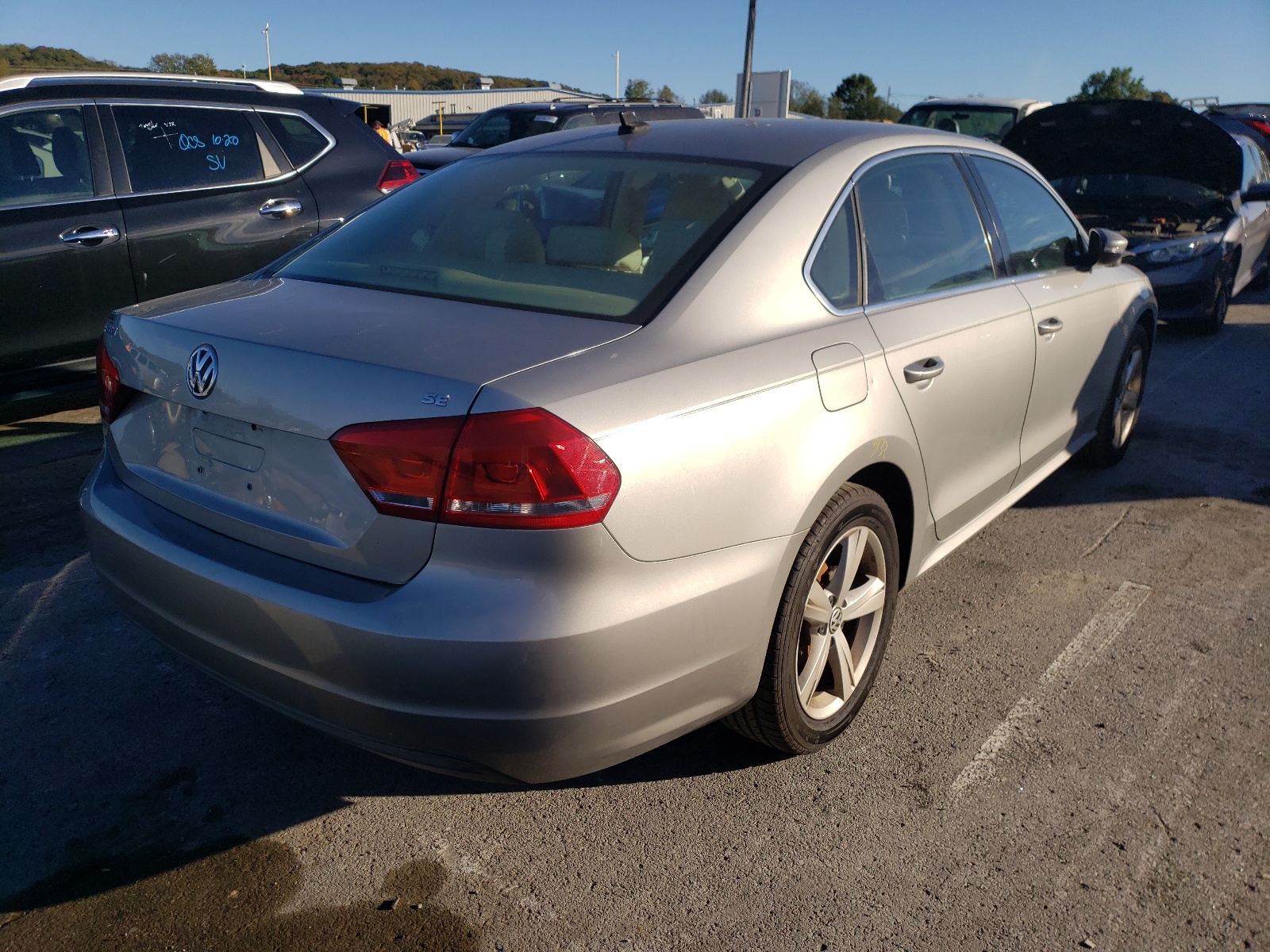 Photo 4 from auction – 2012 VOLKSWAGEN PASSAT SE with VIN 1VWBP7A36CC084024