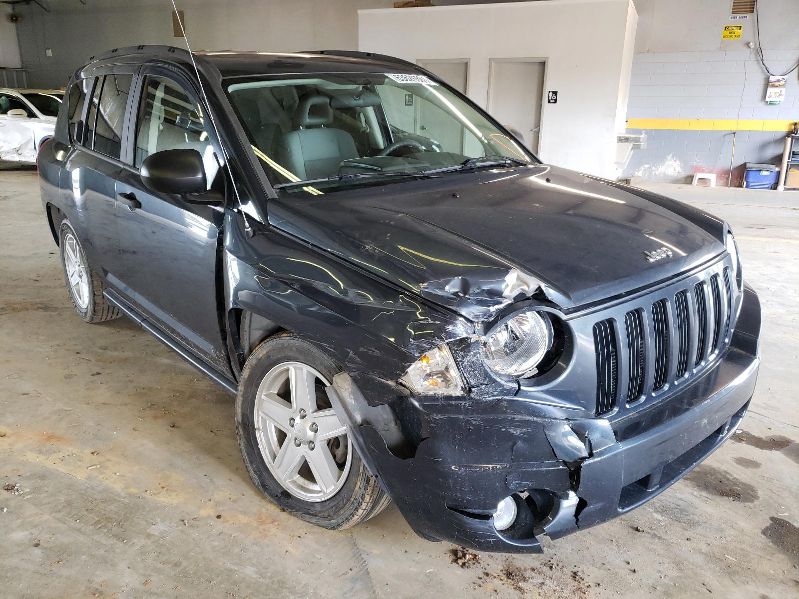 Photo 9 from auction – 2007 JEEP COMPASS with VIN 1J8FT47W37D390252