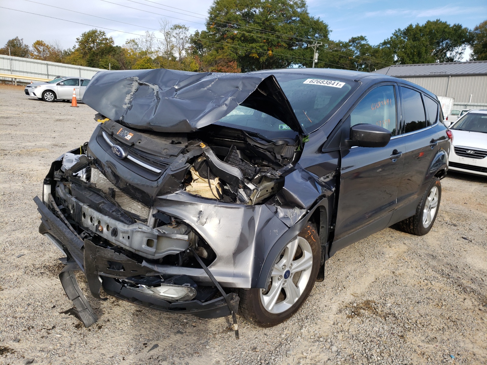 Photo 2 from auction – 2016 FORD ESCAPE SE with VIN 1FMCU9GX0GUB90275