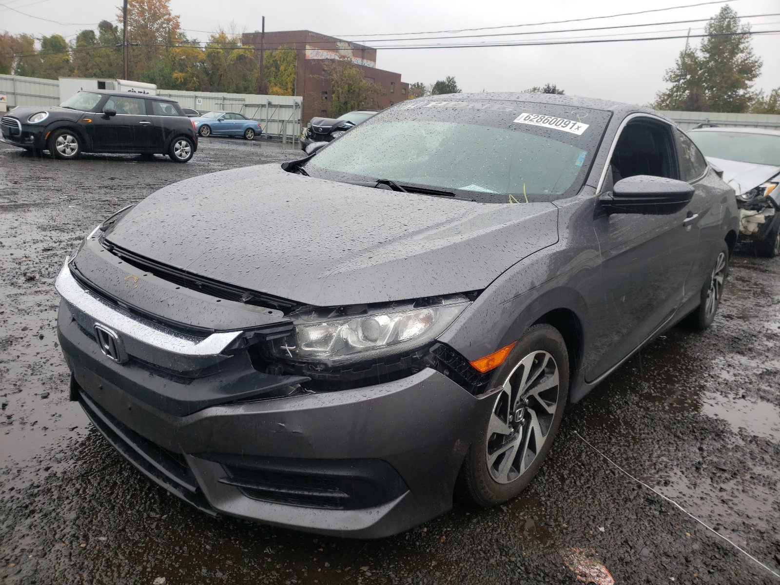 Photo 2 from auction – 2017 HONDA CIVIC LX with VIN 2HGFC4B51HH306263