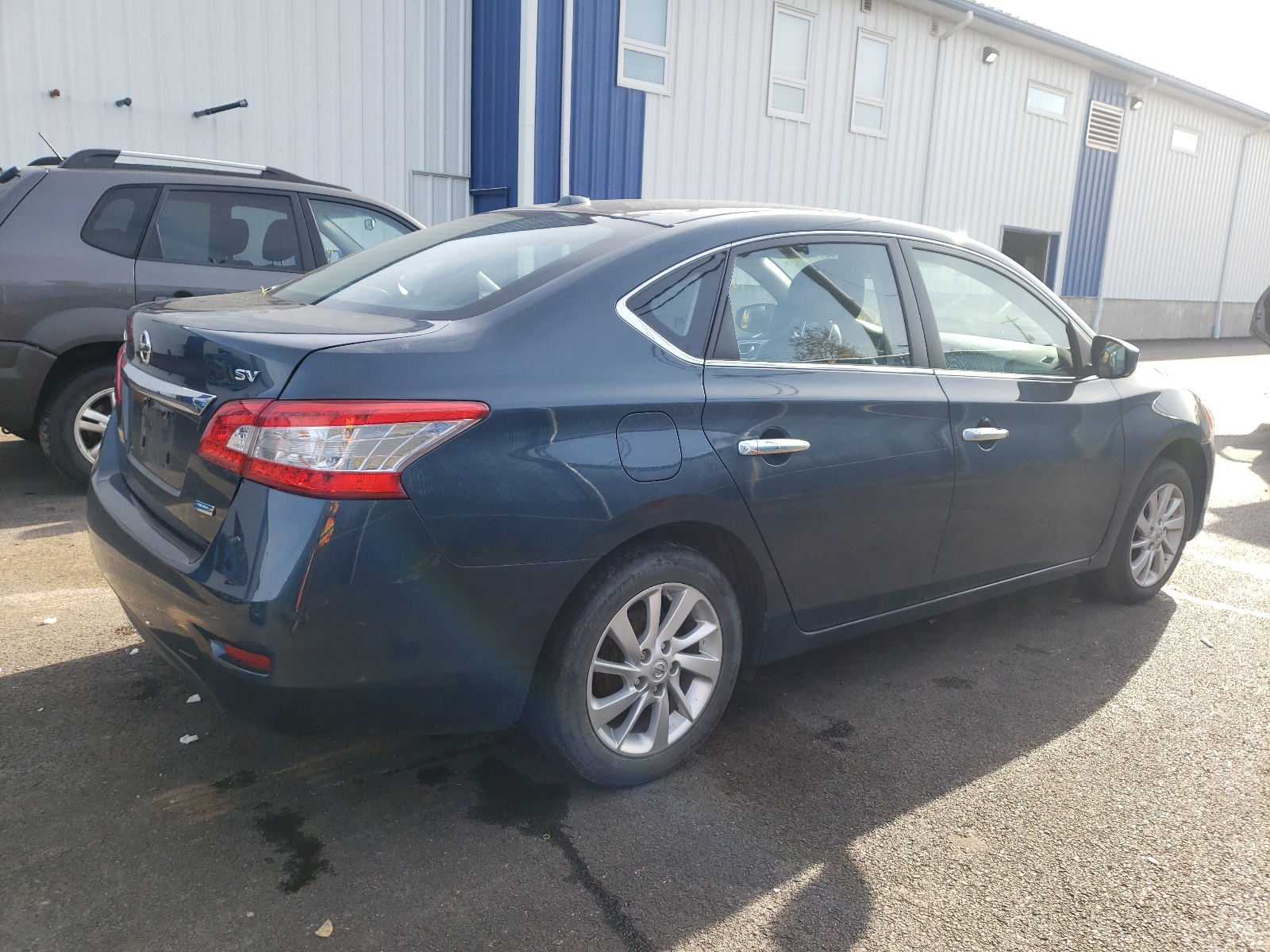 Photo 4 from auction – 2015 NISSAN SENTRA S with VIN 3N1AB7AP8FL638563