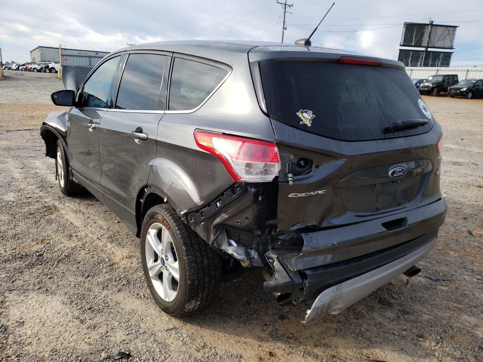 Photo 3 from auction – 2016 FORD ESCAPE SE with VIN 1FMCU9GX0GUB90275
