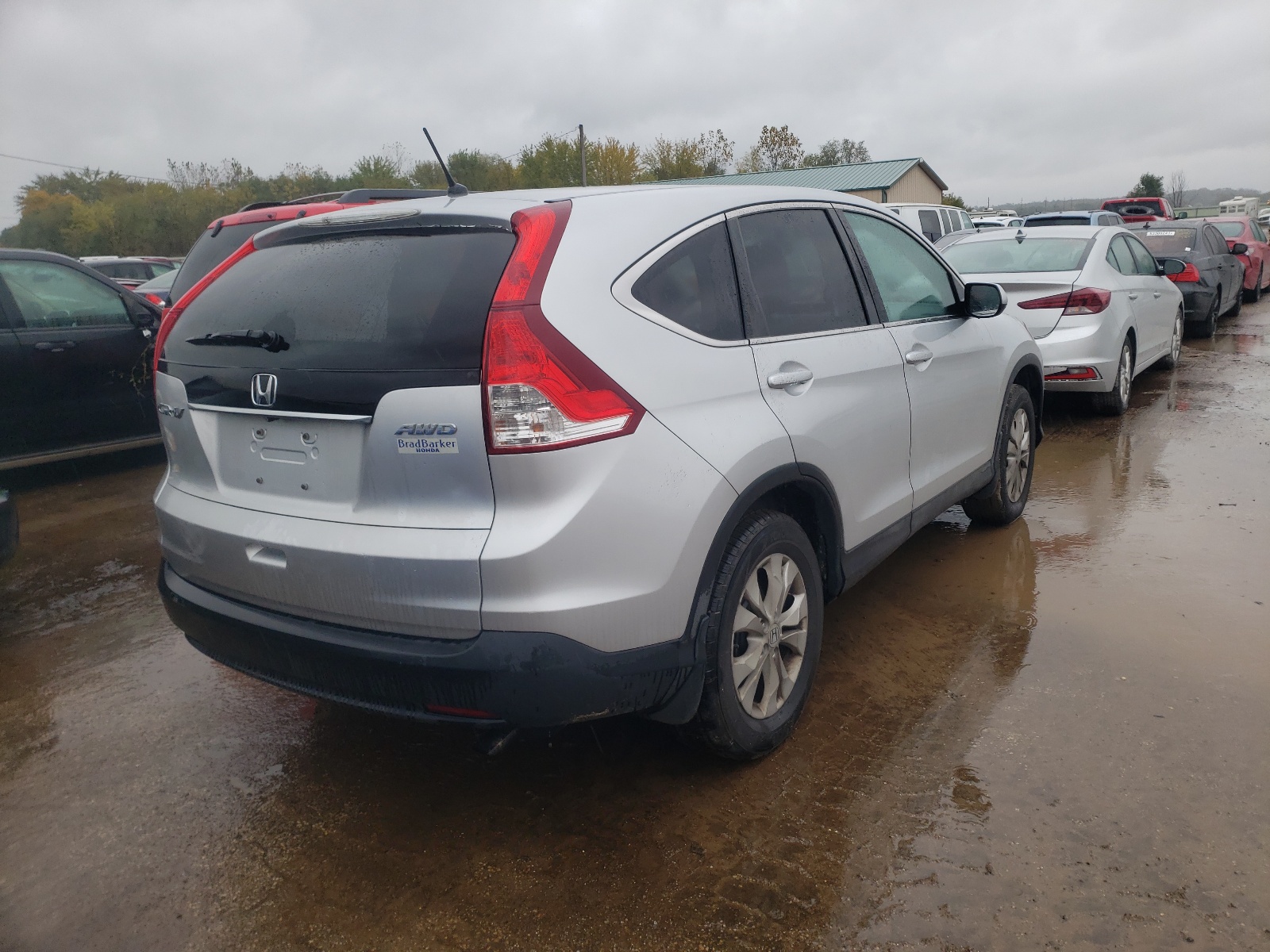 Photo 4 from auction – 2013 HONDA CR-V EX with VIN 2HKRM4H51DH679238