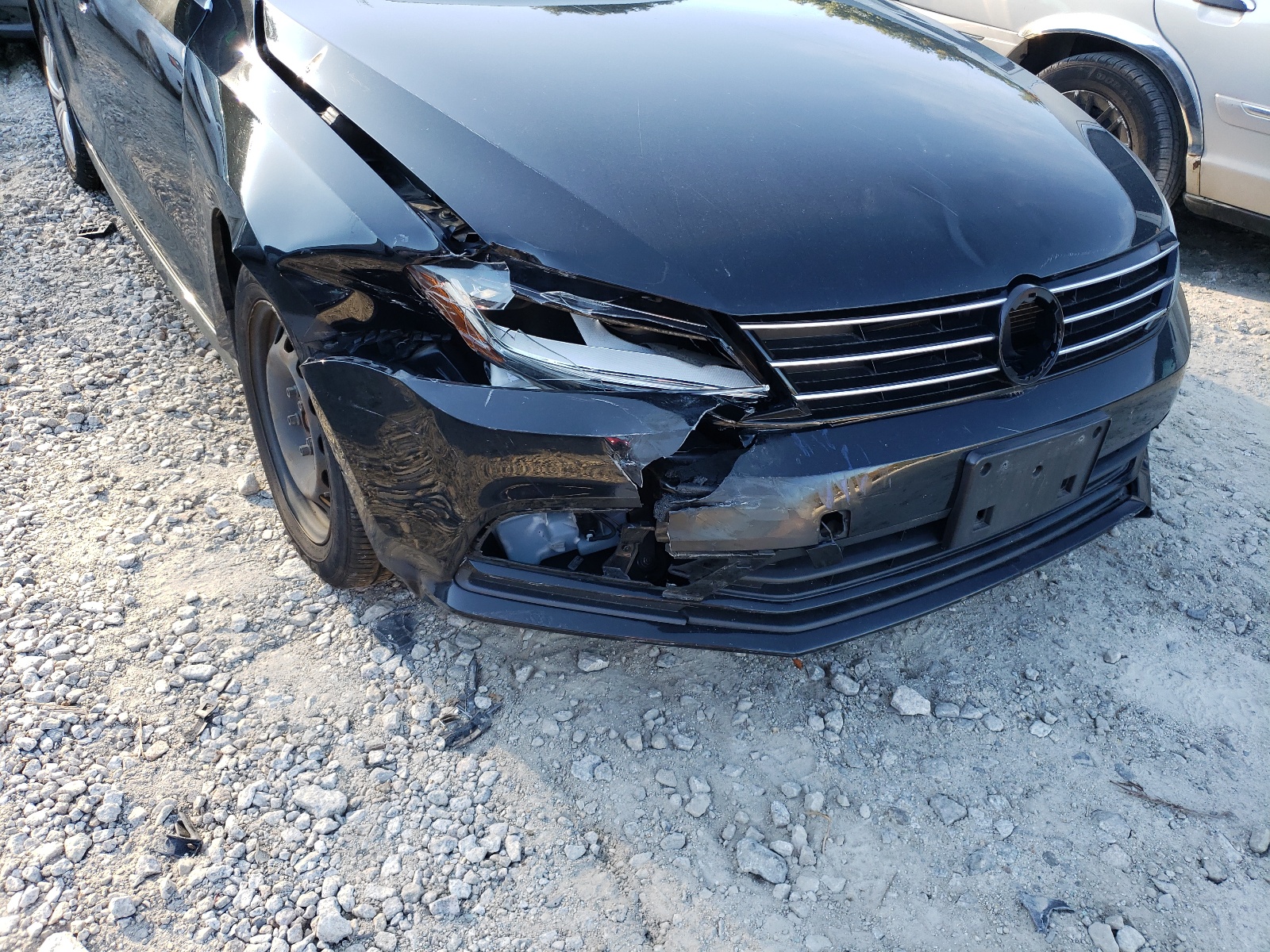 Photo 9 from auction – 2017 VOLKSWAGEN JETTA S with VIN 3VW2B7AJ2HM408671