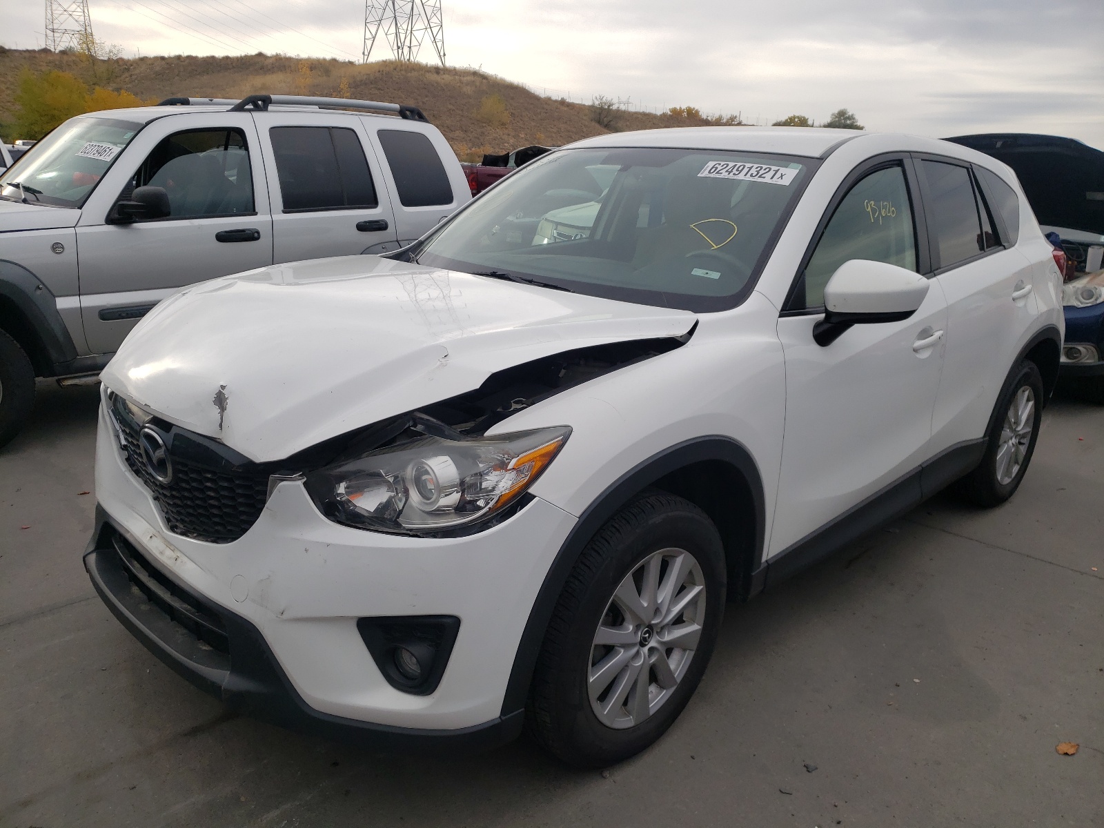Photo 2 from auction – 2015 MAZDA CX-5 TOURI with VIN JM3KE2CY7F0464023