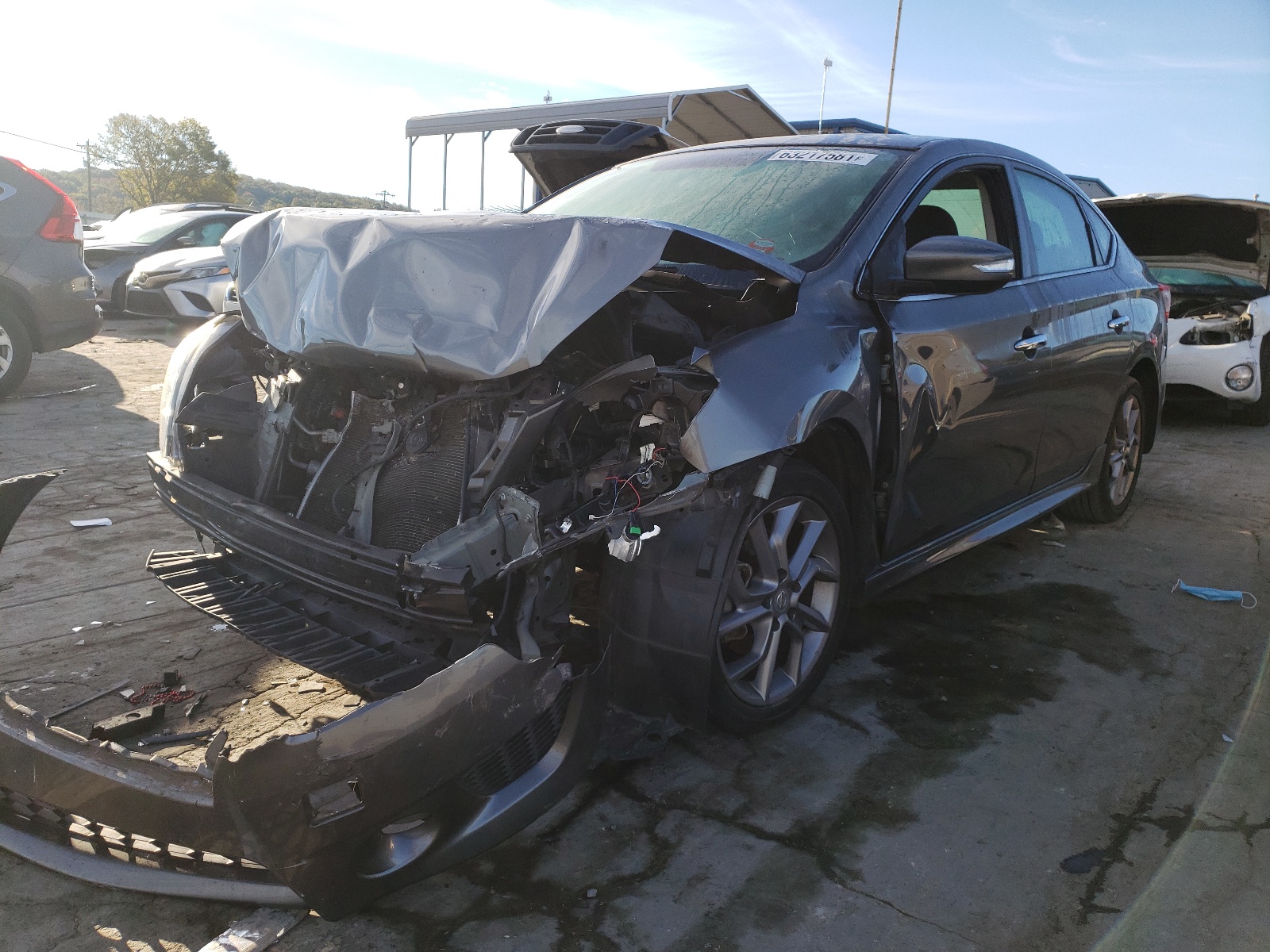 Photo 2 from auction – 2015 NISSAN SENTRA S with VIN 3N1AB7AP8FY243754