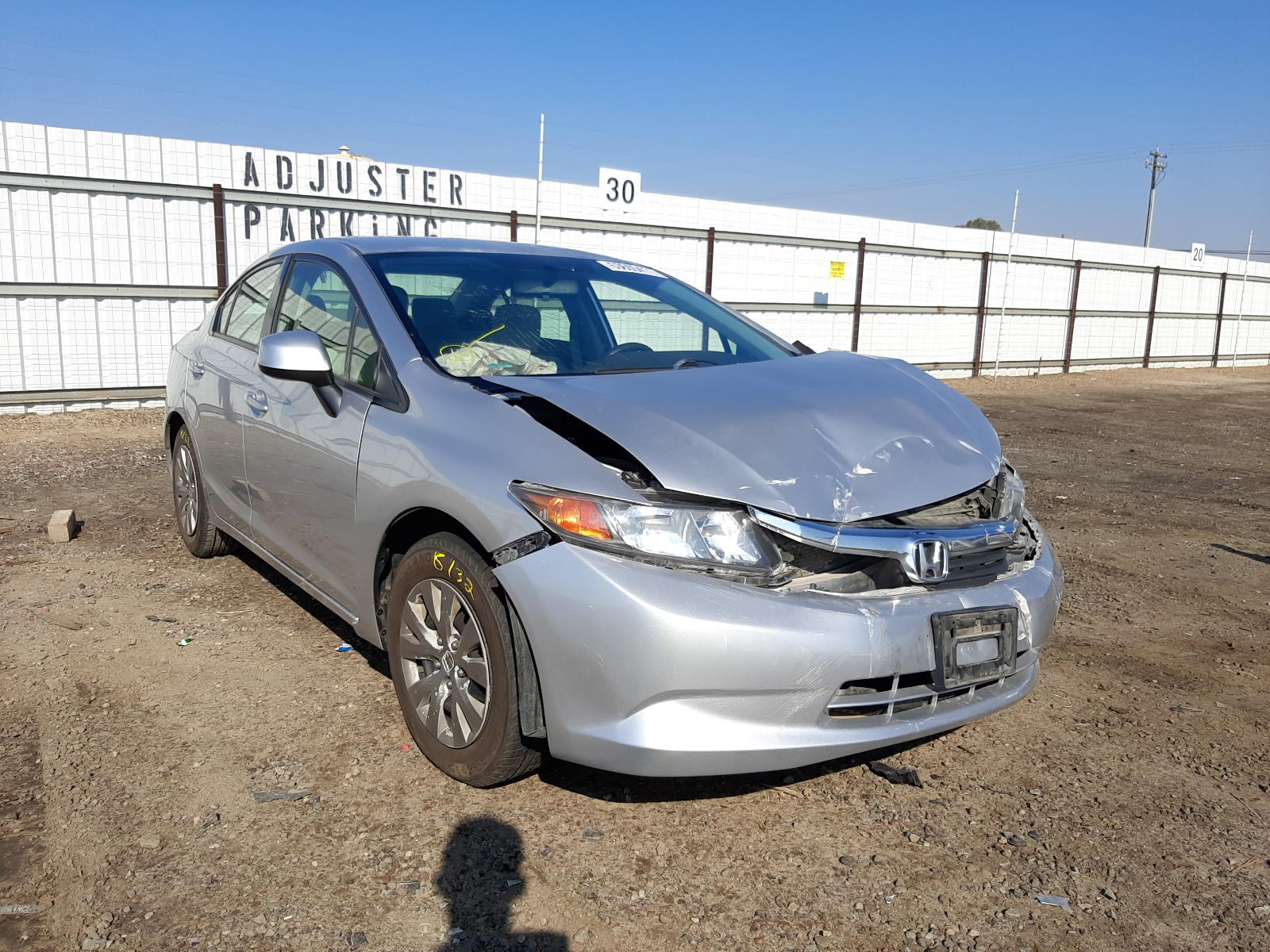 HONDA CIVIC LX 2012 with VIN JHMFB2F58CS004985 - Photo from auction