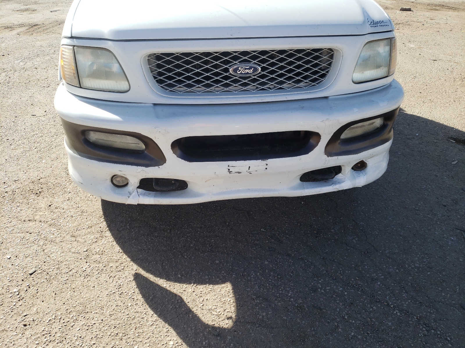 Photo 9 from auction – 1998 FORD F150 with VIN 1FTRX18LXWNB56744