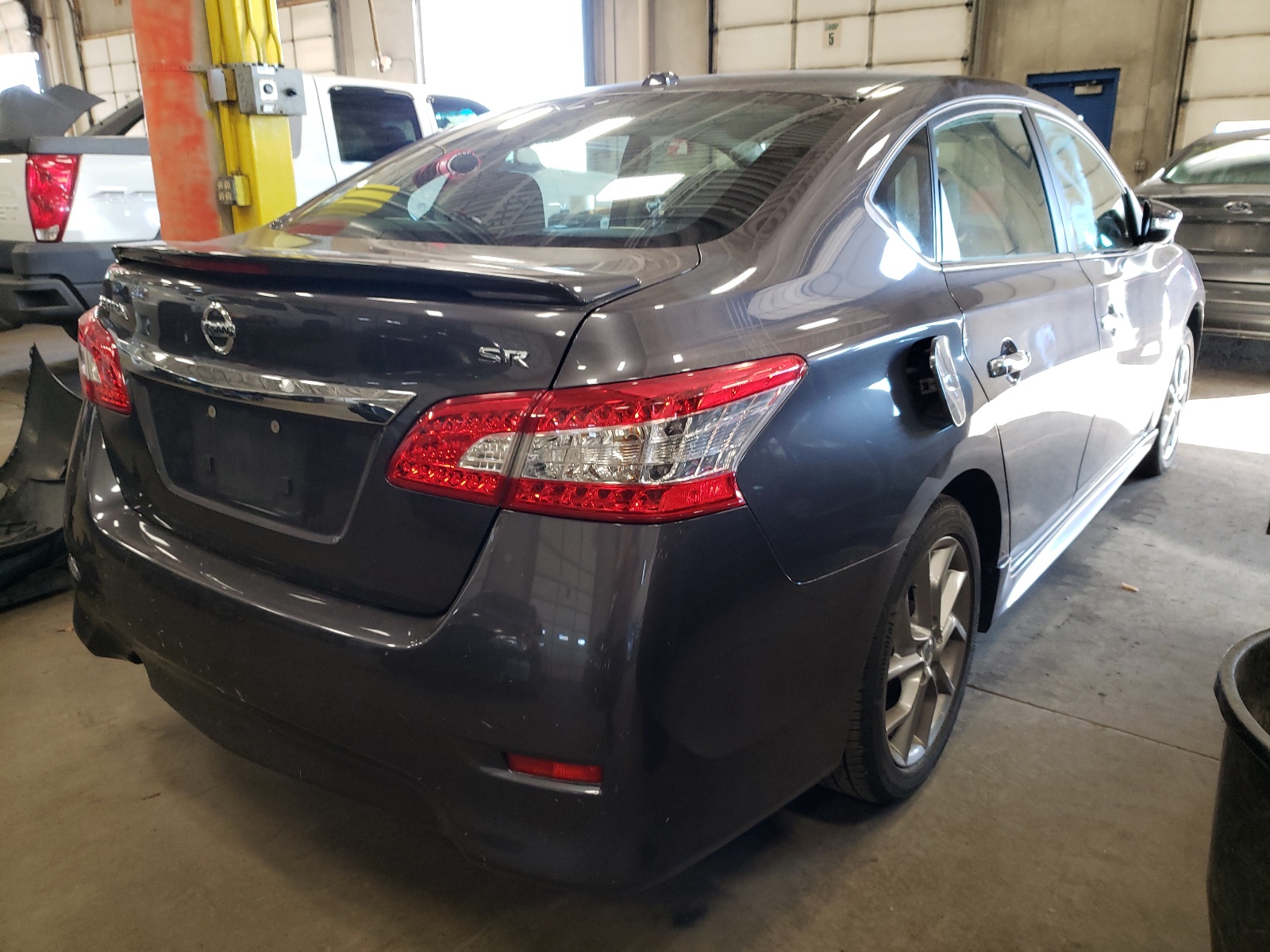 Photo 4 from auction – 2015 NISSAN SENTRA S with VIN 3N1AB7AP2FY269377