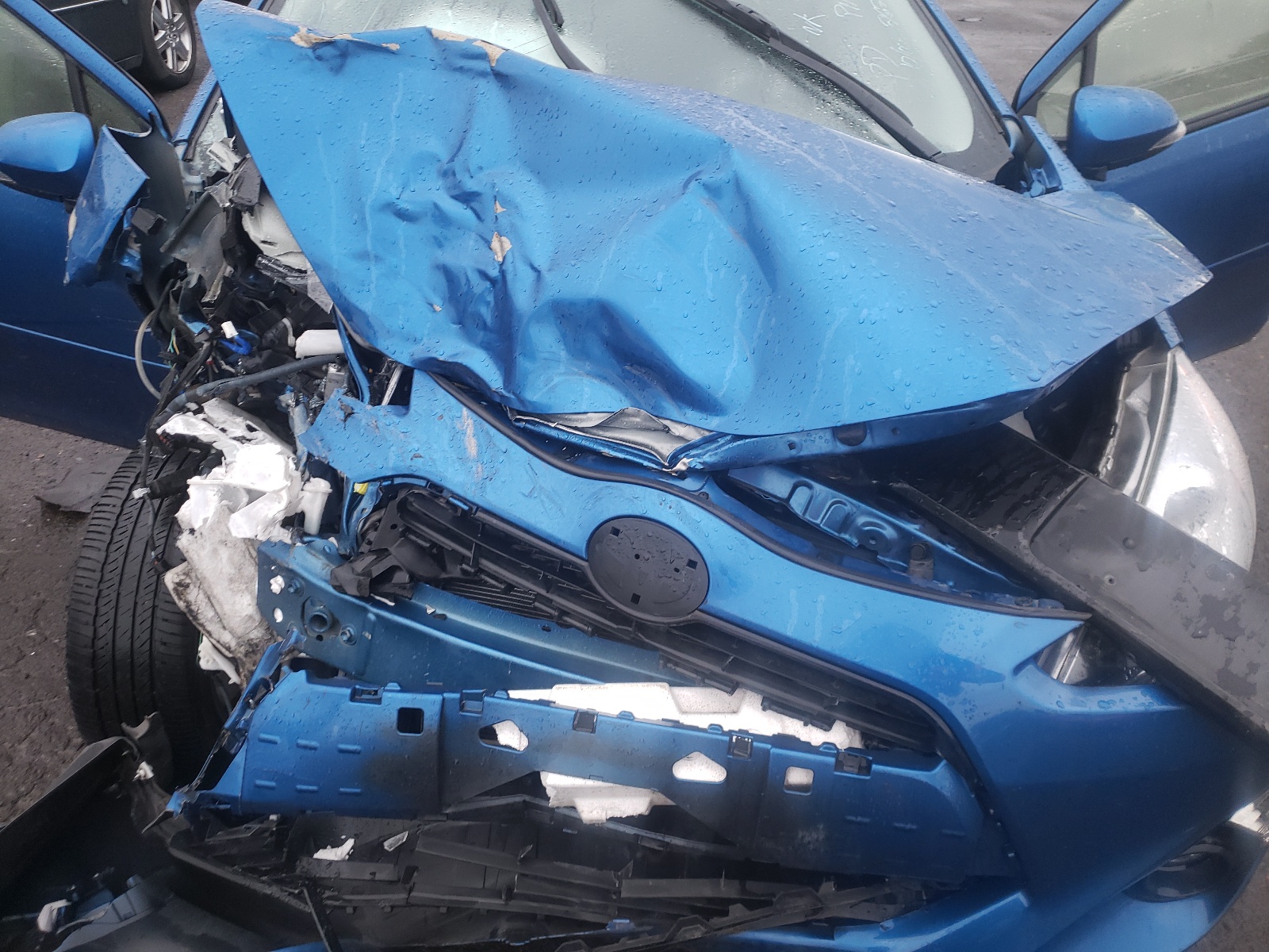 Photo 7 from auction – 2015 TOYOTA PRIUS C with VIN JTDKDTB38F1091768