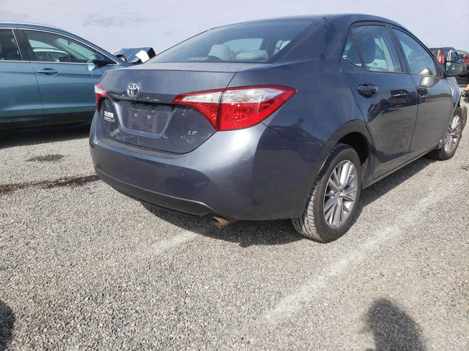 Photo 4 from auction – 2014 TOYOTA COROLLA L with VIN 2T1BURHE6EC099759