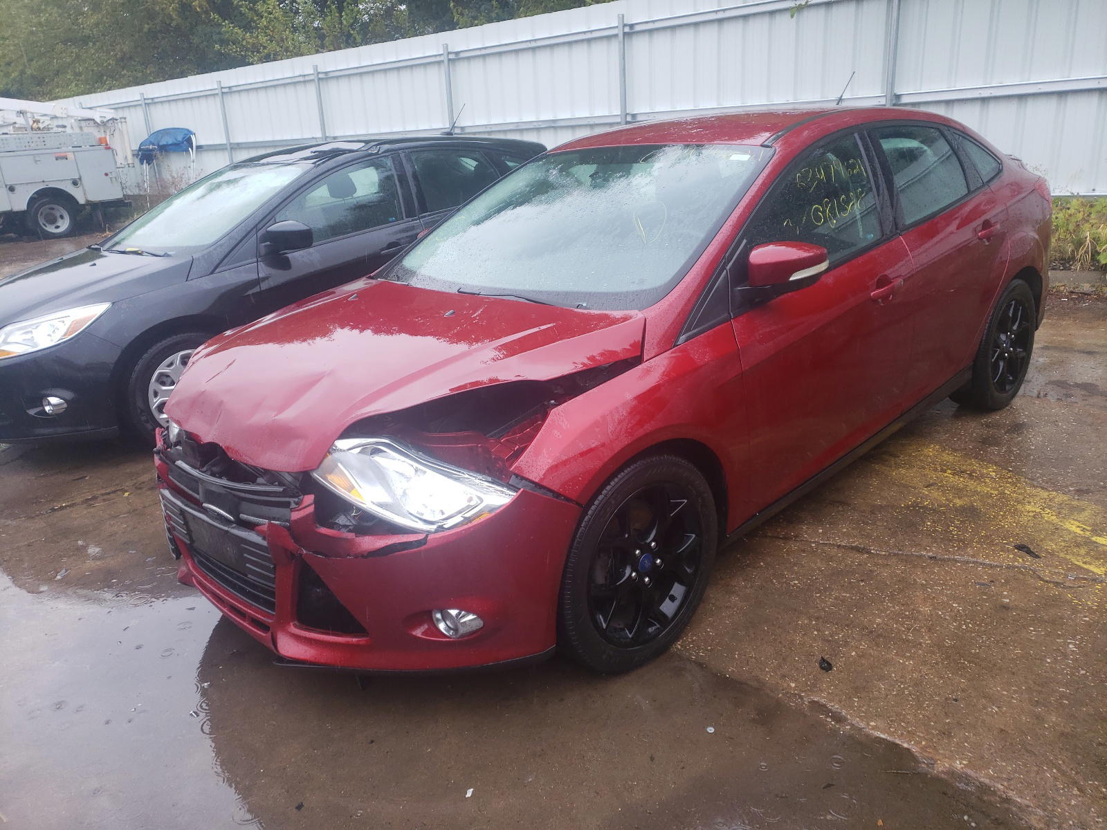 Photo 2 from auction – 2013 FORD FOCUS SE with VIN 1FADP3F25DL220140
