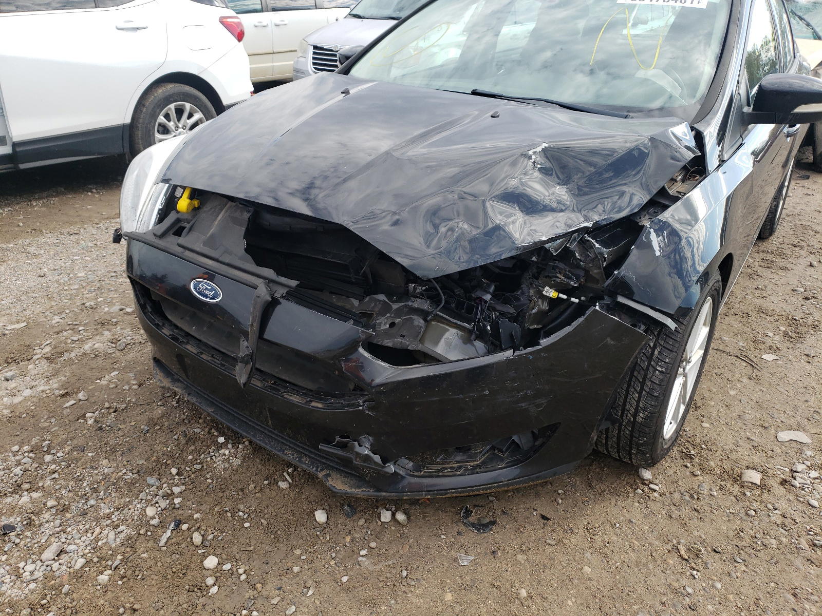 Photo 9 from auction – 2015 FORD FOCUS SE with VIN 1FADP3F23FL293297