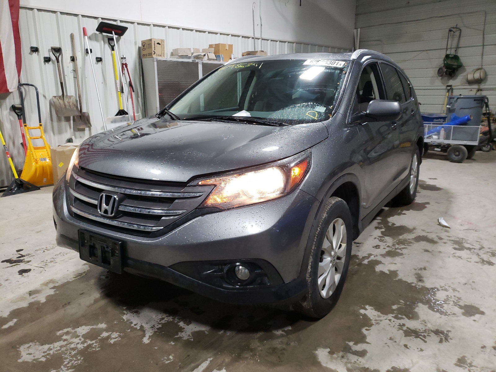 Photo 2 from auction – 2014 HONDA CR-V EXL with VIN 5J6RM4H73EL093620