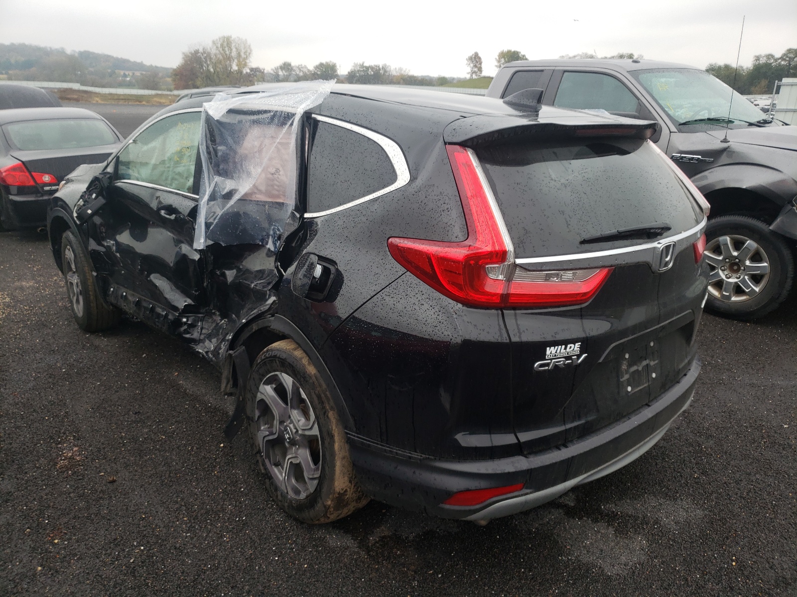 Photo 3 from auction – 2018 HONDA CR-V EXL with VIN 7FARW2H83JE025834