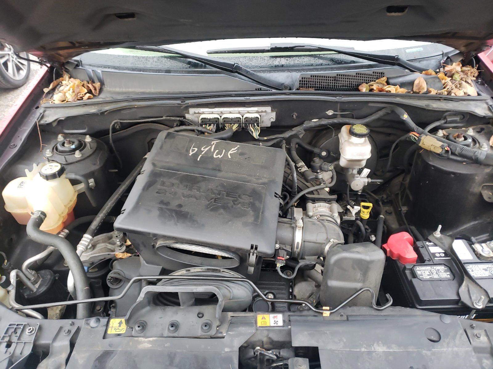 Photo 7 from auction – 2011 FORD ESCAPE LIM with VIN 1FMCU9EG2BKC06211