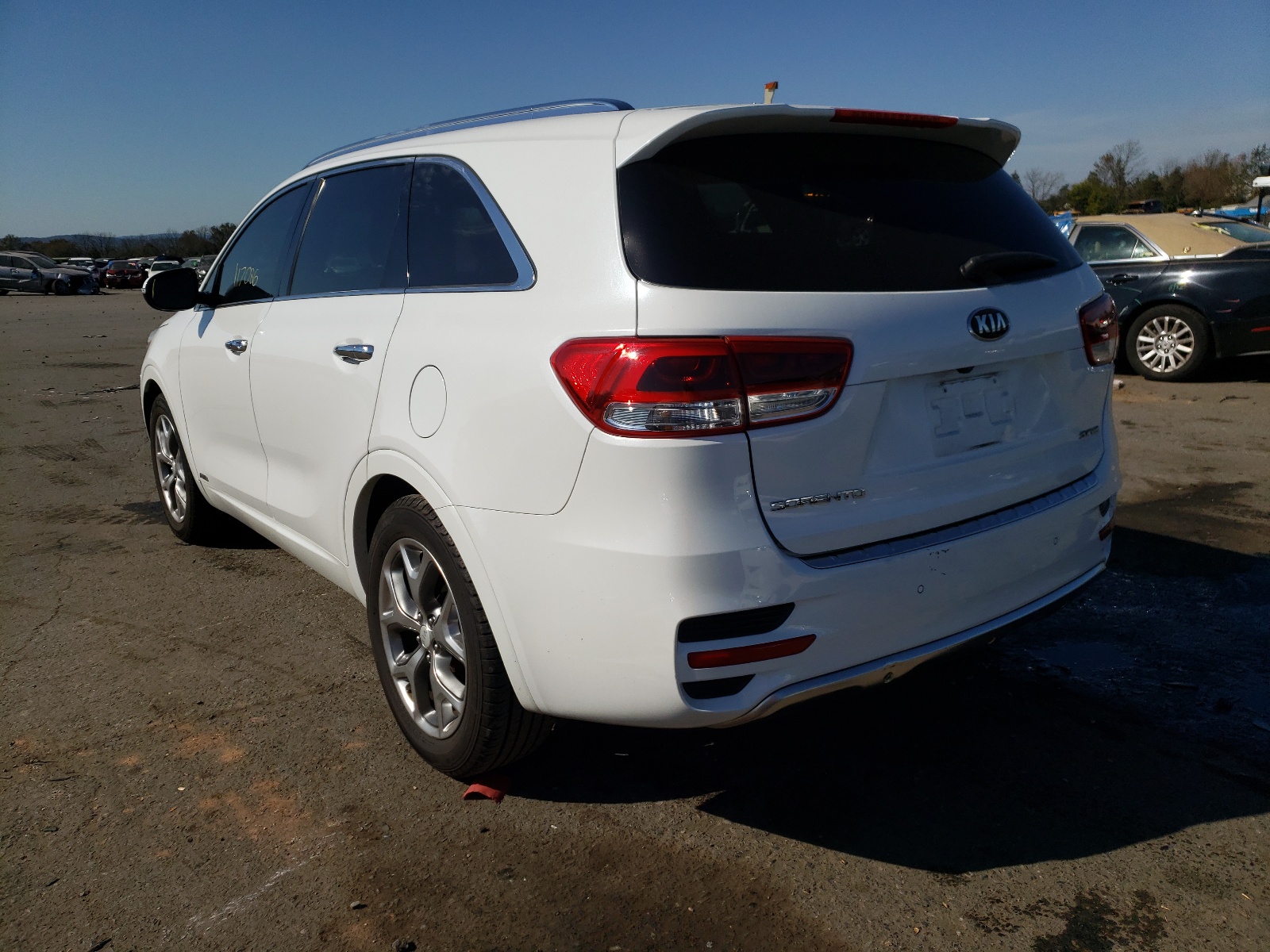Photo 3 from auction – 2016 KIA SORENTO SX with VIN 5XYPKDA50GG018013