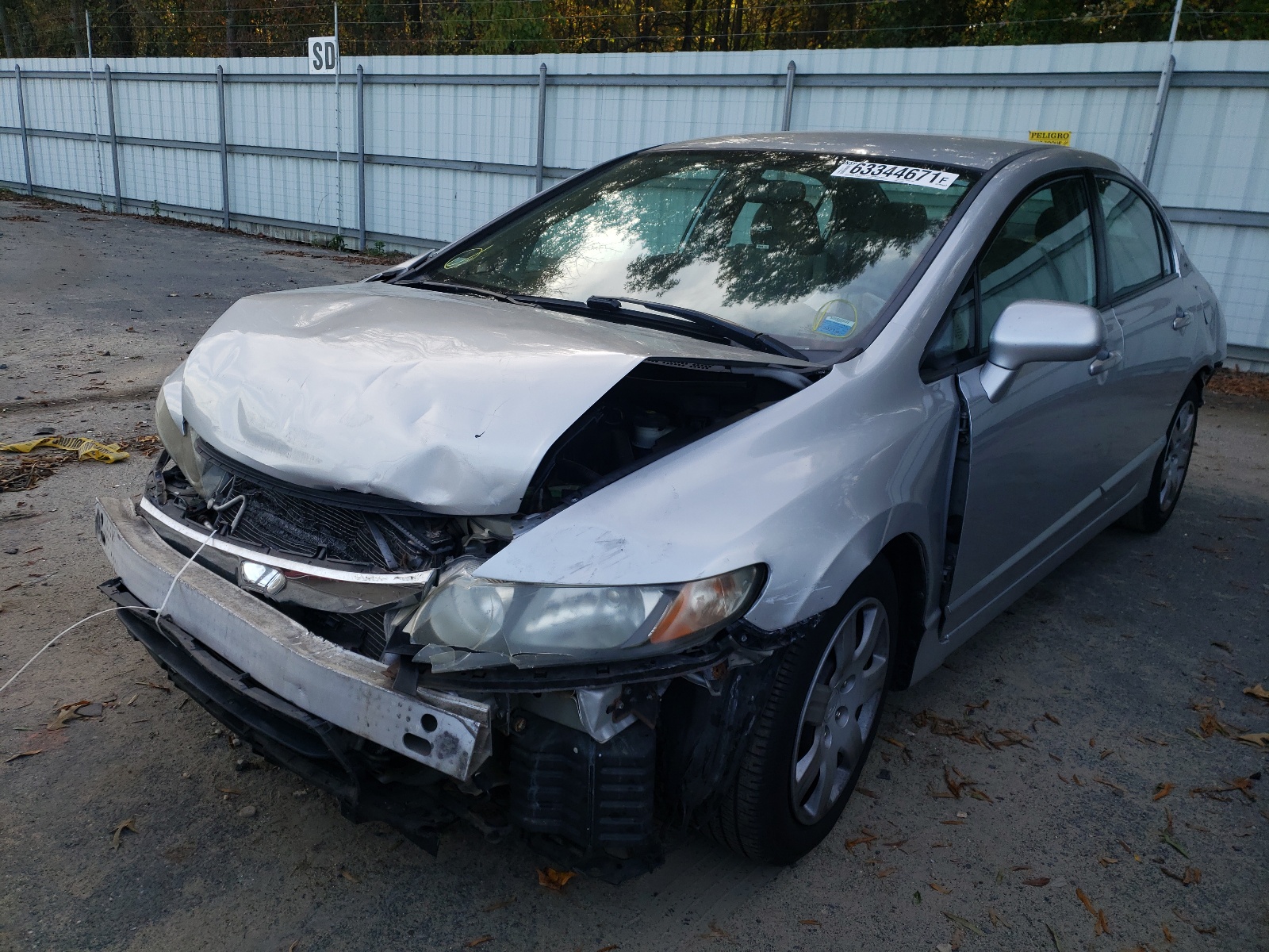 Photo 2 from auction – 2010 HONDA CIVIC LX with VIN 2HGFA1F56AH575086