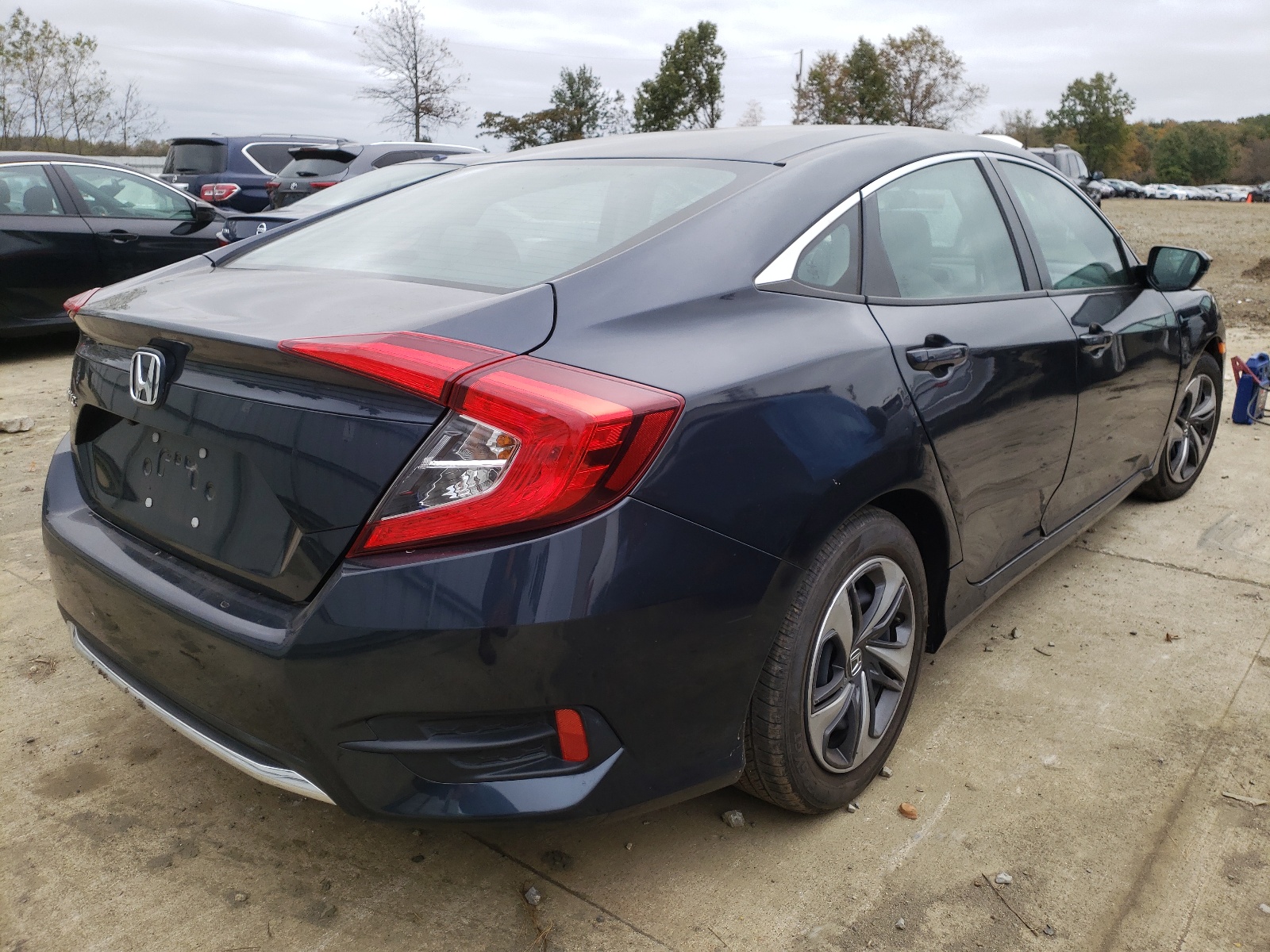 Photo 4 from auction – 2019 HONDA CIVIC LX with VIN 2HGFC2F67KH592862