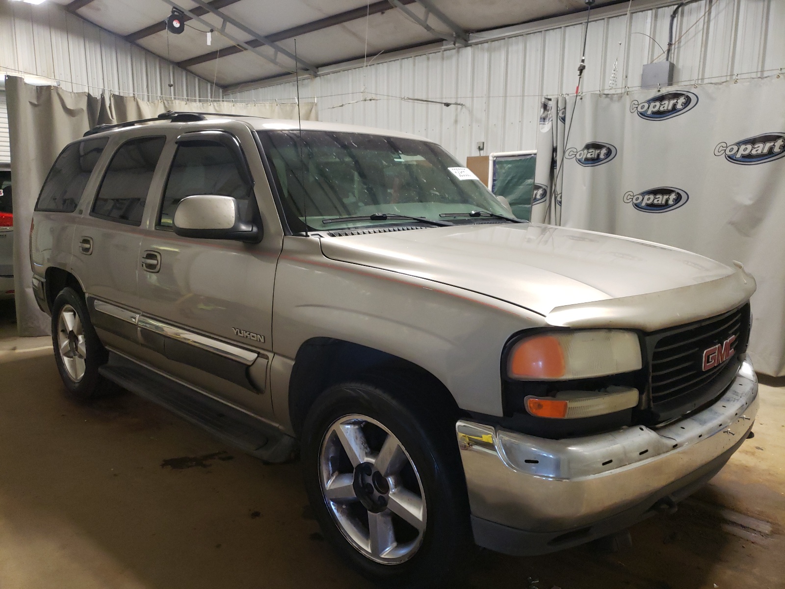 GMC YUKON 2000 with VIN 1GKEC13T9YJ134136 - Photo from auction