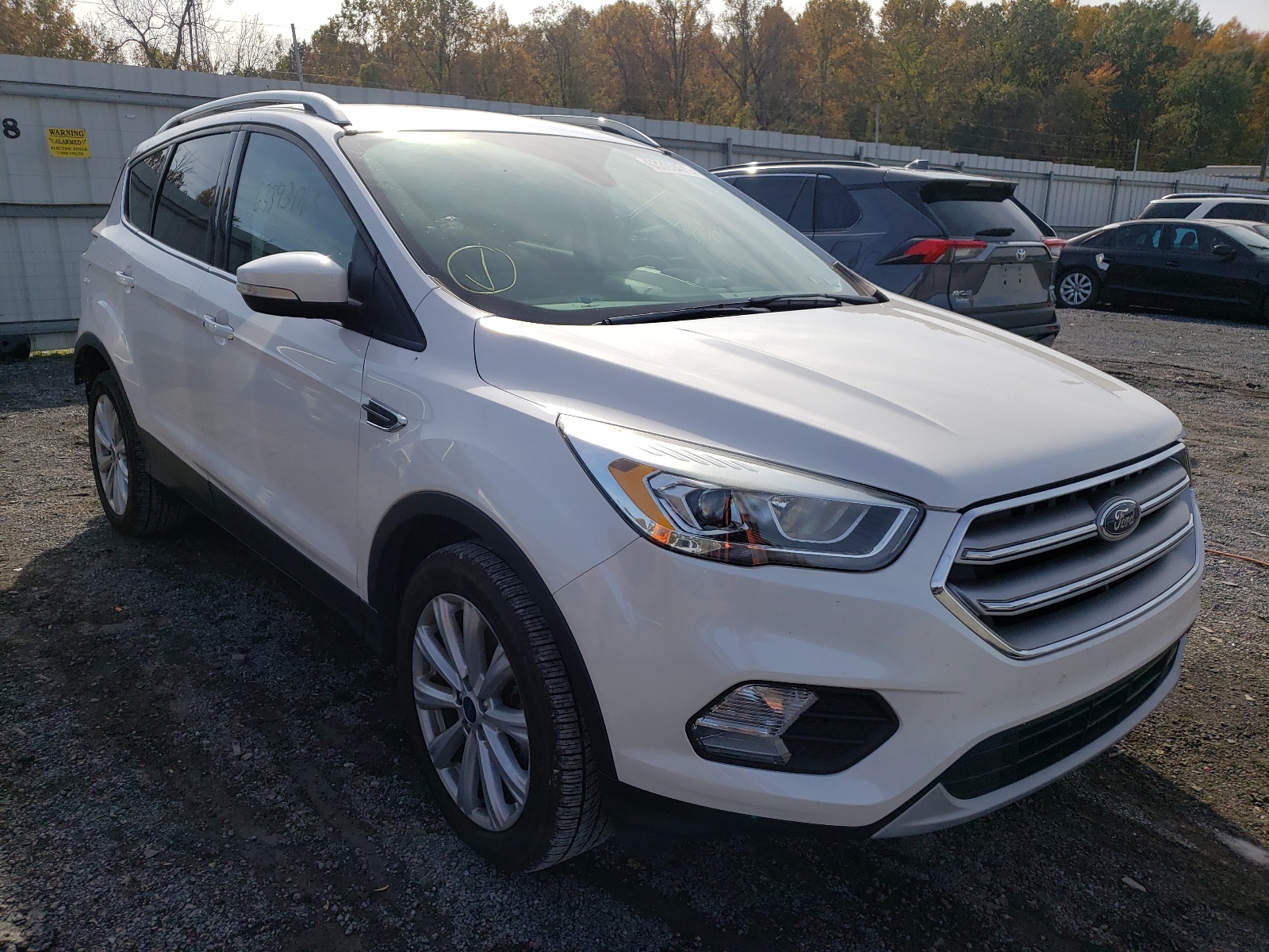 FORD ESCAPE TIT 2017 with VIN 1FMCU9JD9HUA18200 - Photo from auction