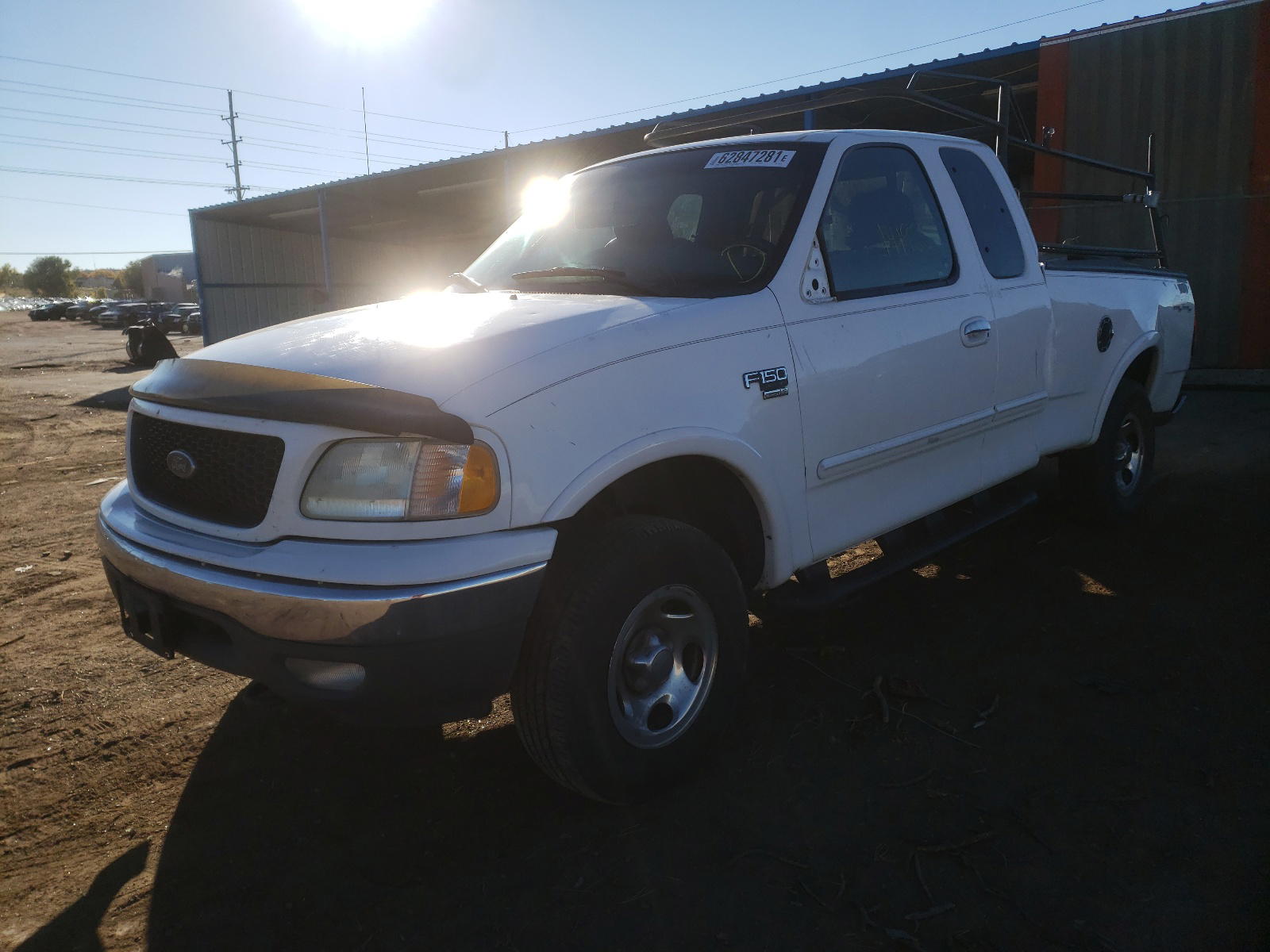 Photo 2 from auction – 2002 FORD F150 with VIN 1FTRX18LX2NA91730