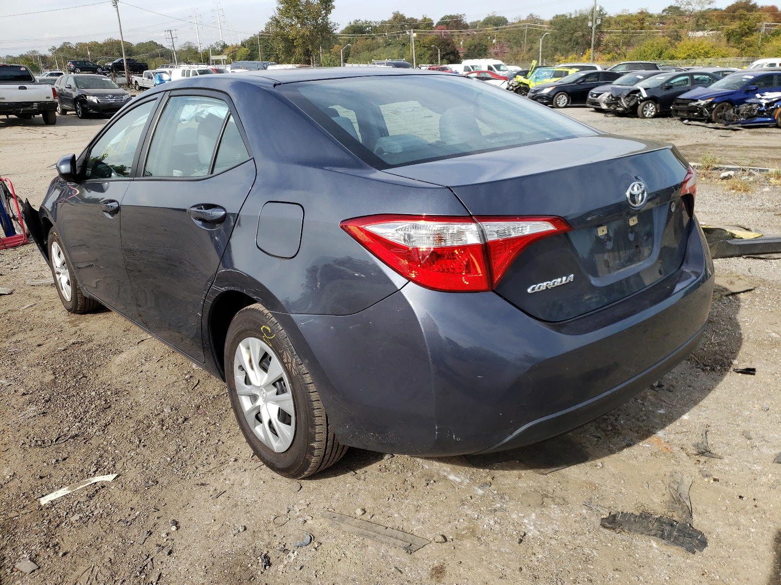 Photo 3 from auction – 2016 TOYOTA COROLLA L with VIN 5YFBURHE6GP553043