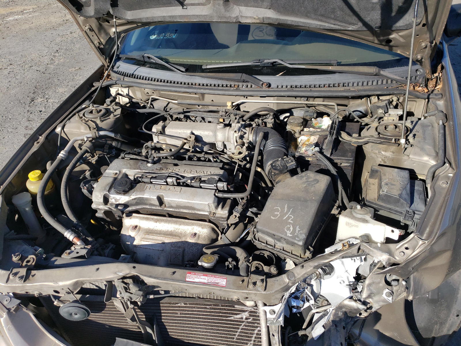 Photo 7 from auction – 2000 MAZDA PROTEGE with VIN JM1BJ2228Y0258228