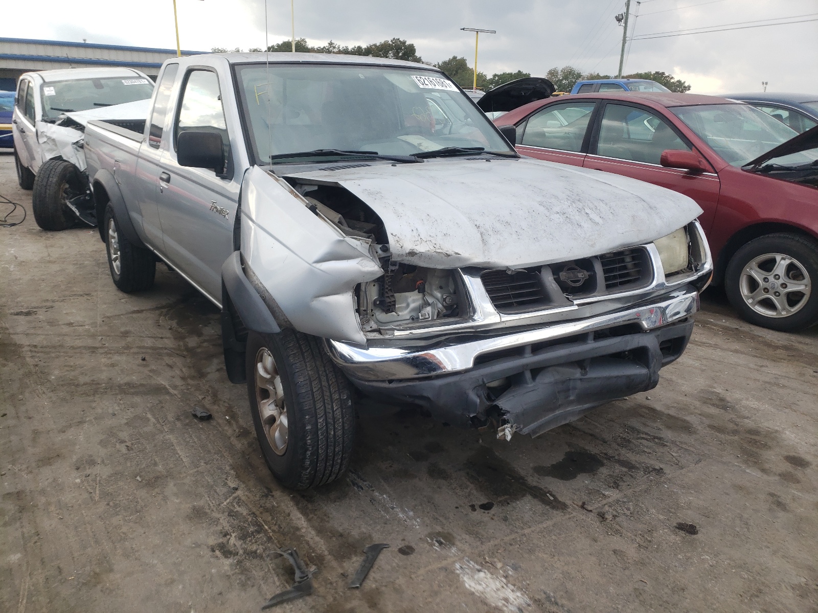 NISSAN FRONTIER K 2000 with VIN 1N6ED26T1YC371912 - Photo from auction