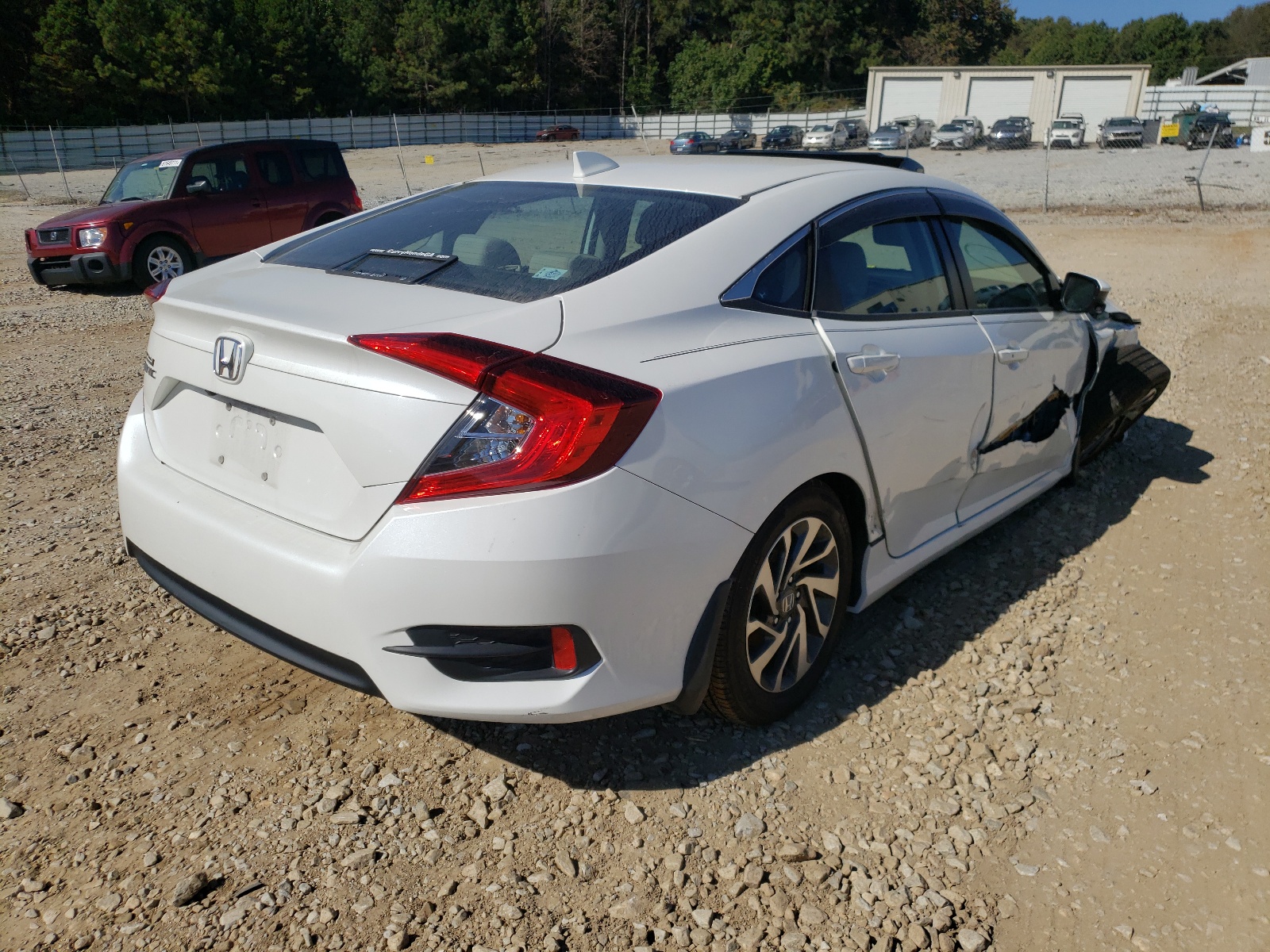 Photo 4 from auction – 2018 HONDA CIVIC EX with VIN 19XFC2F86JE035399