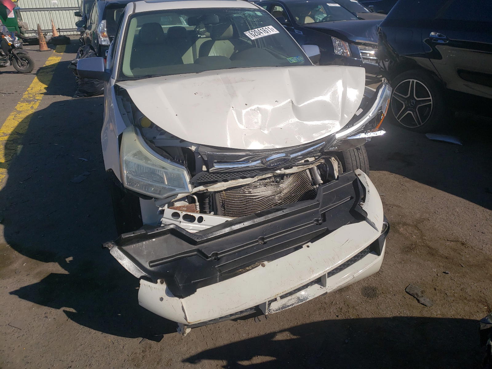Photo 9 from auction – 2011 FORD FOCUS SEL with VIN 1FAHP3HN3BW115083