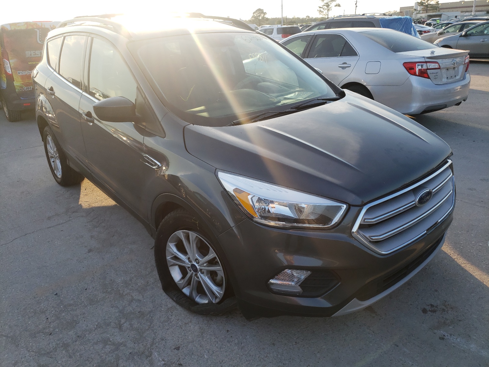 Photo 1 from auction – 2018 FORD ESCAPE SE with VIN 1FMCU0GD2JUA12571