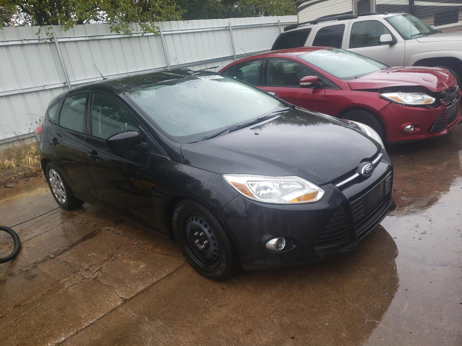 FORD FOCUS SE 2012 with VIN 1FAHP3K20CL366032 - Photo from auction