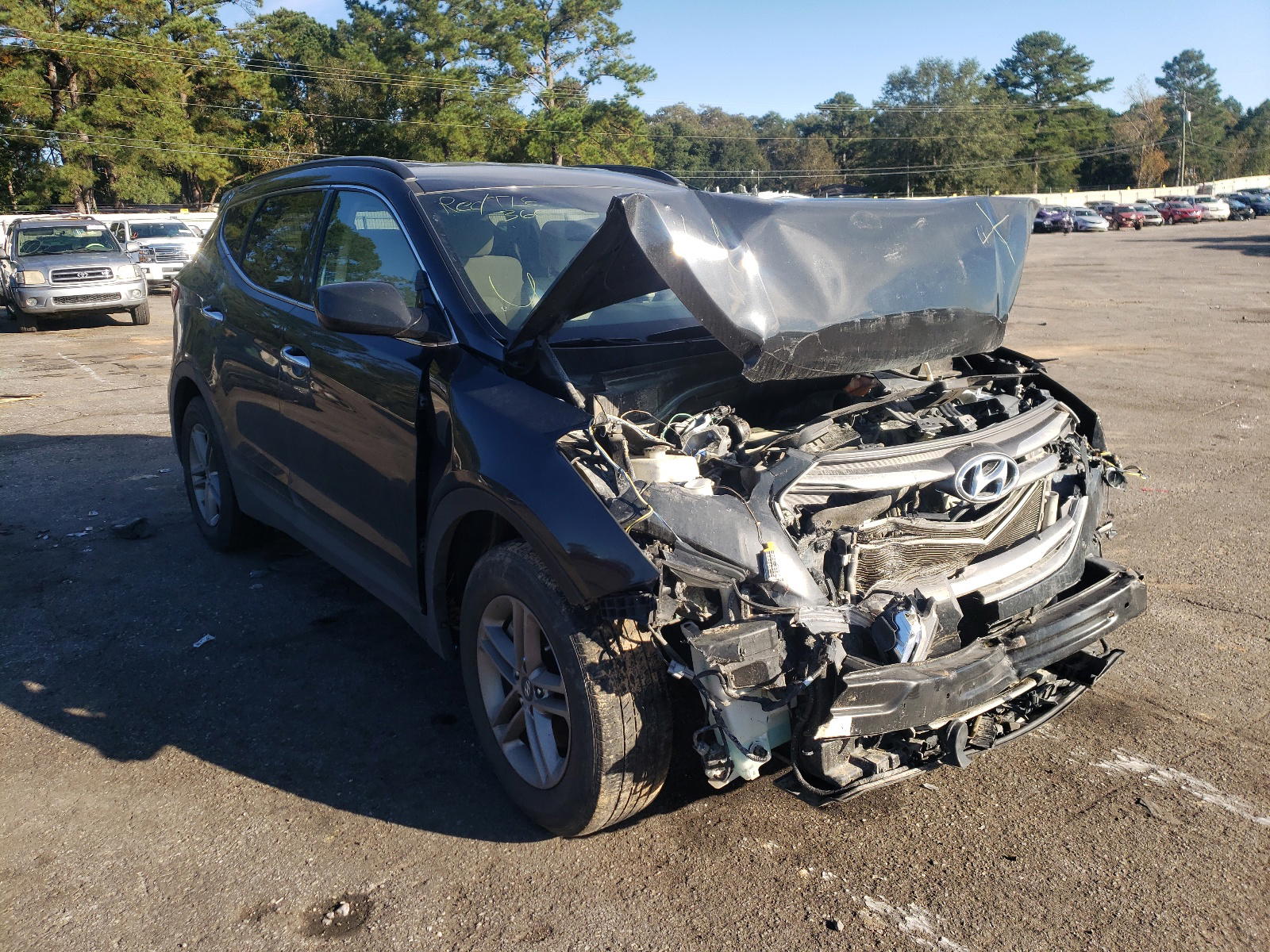 HYUNDAI SANTA FE S 2017 with VIN 5NMZU3LB2HH040800 - Photo from auction
