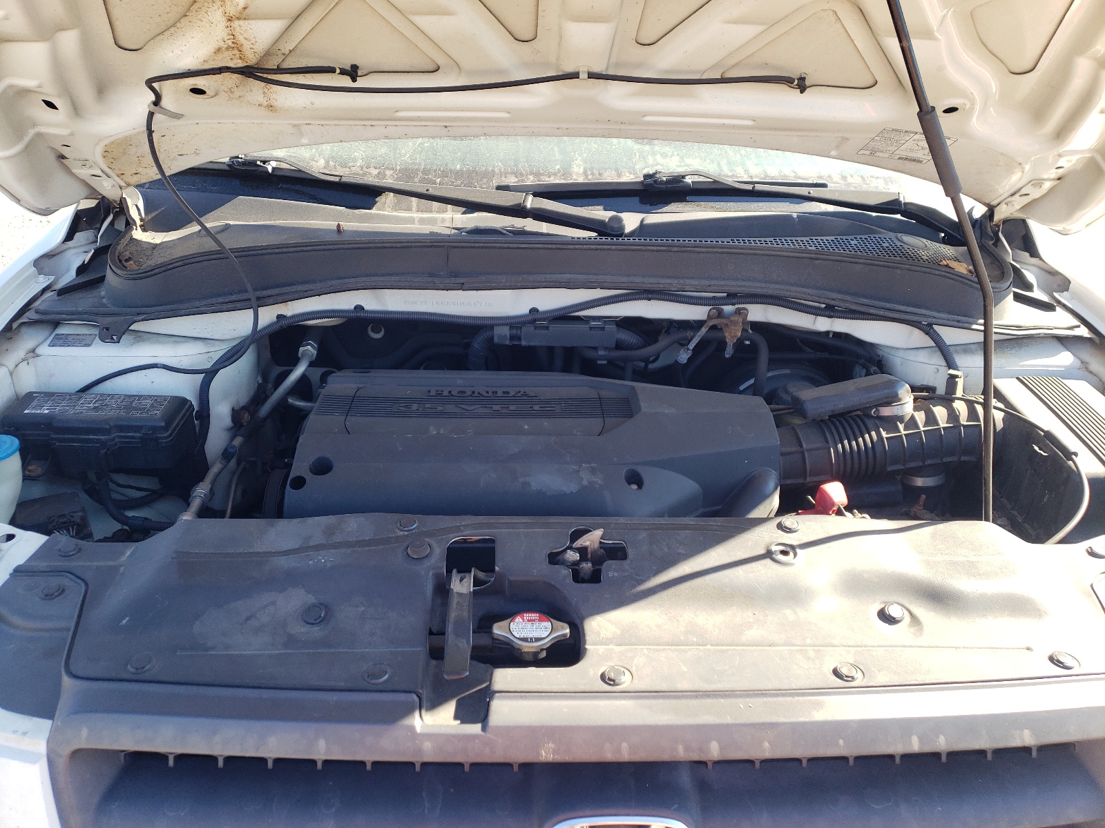 Photo 7 from auction – 2004 HONDA PILOT EXL with VIN 2HKYF18684H564715