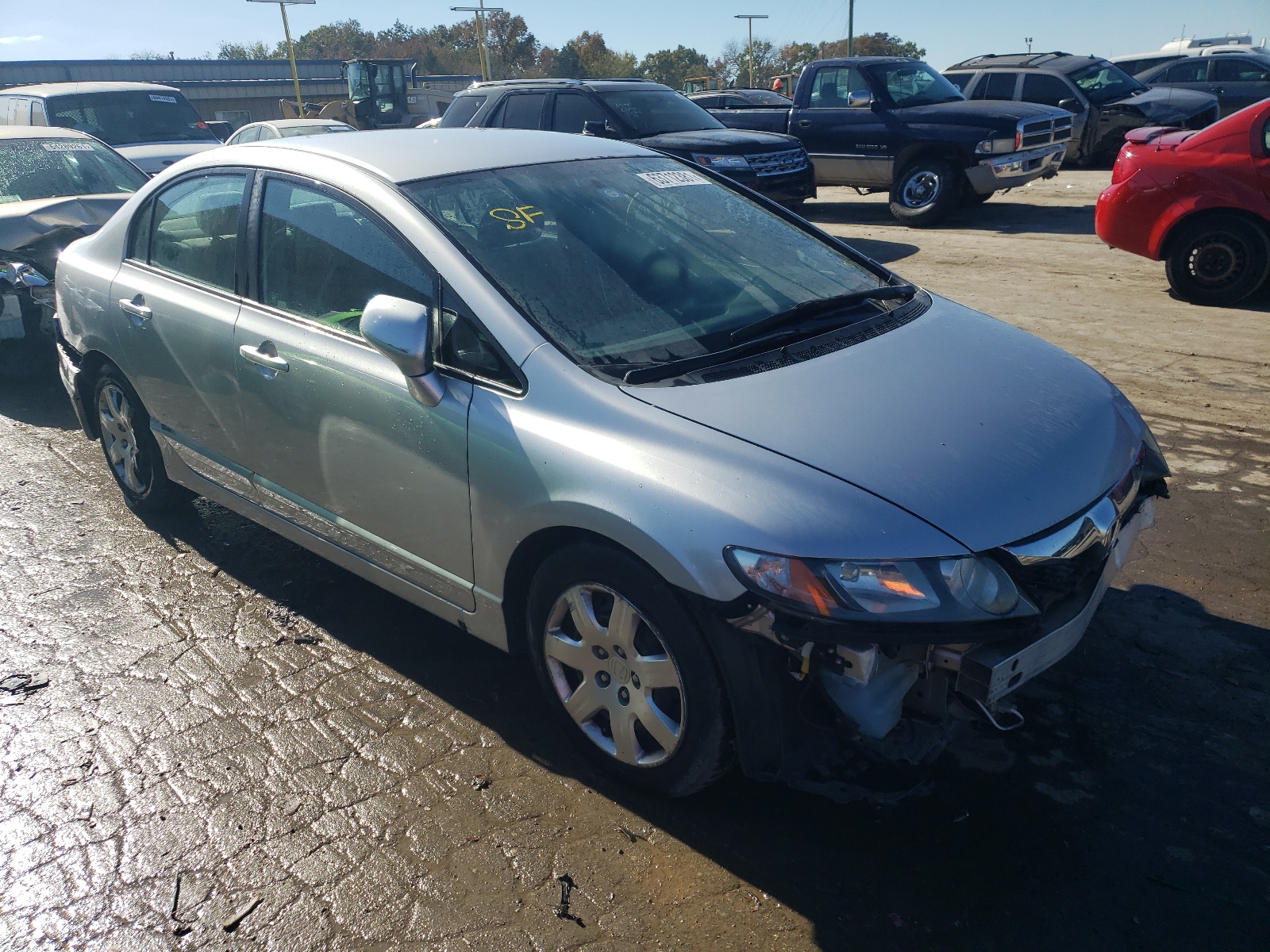 HONDA CIVIC LX 2011 with VIN 19XFA1F50BE044090 - Photo from auction