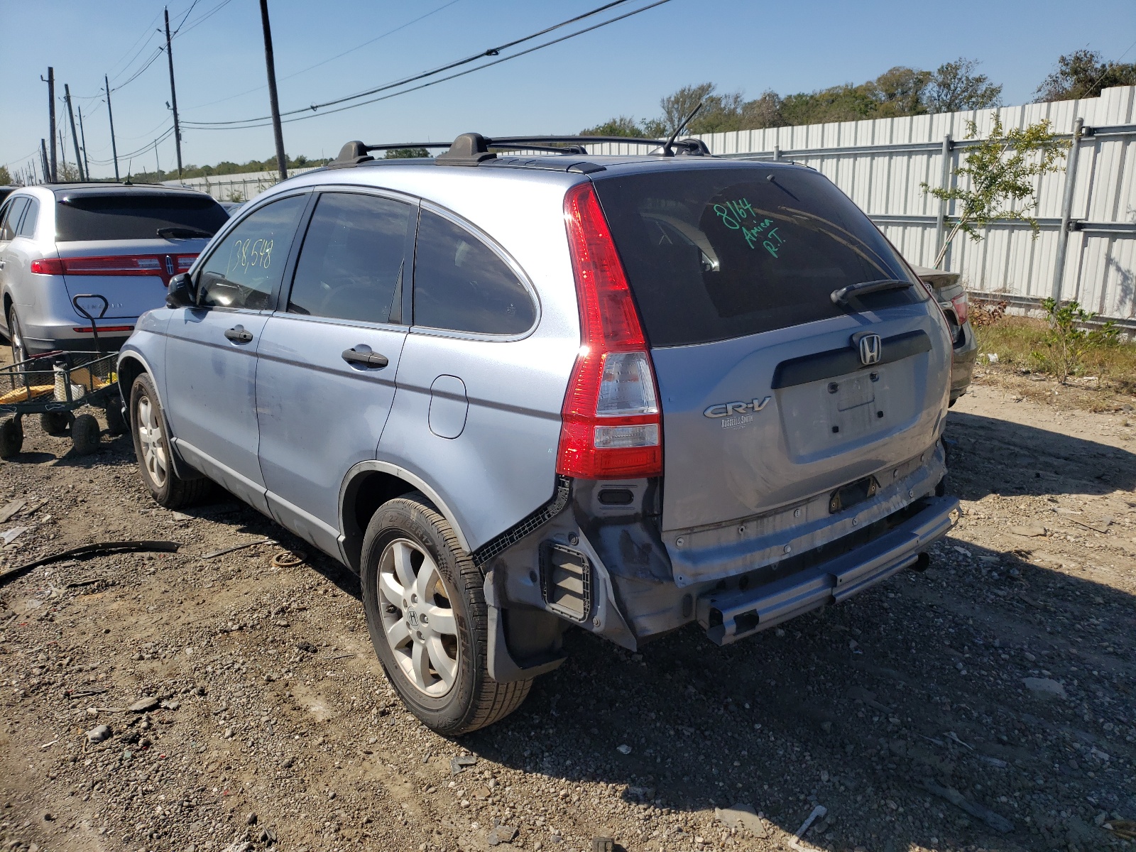 Photo 3 from auction – 2011 HONDA CR-V SE with VIN JHLRE3H46BC000400