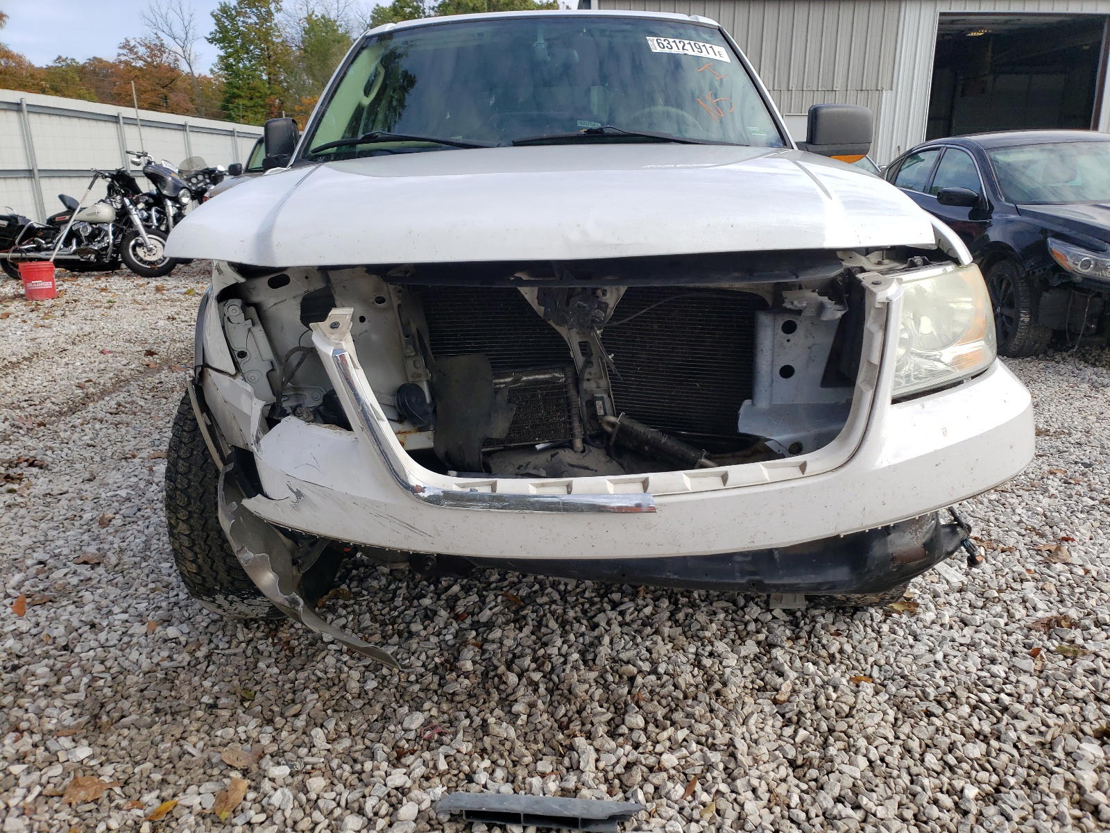 Photo 9 from auction – 2004 FORD EXPEDITION with VIN 1FMPU17L64LB30034