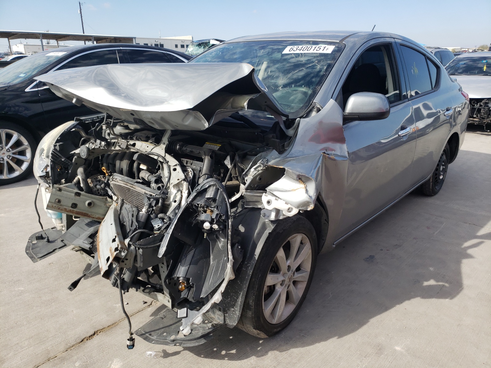 Photo 2 from auction – 2014 NISSAN VERSA S with VIN 3N1CN7APXEL852081