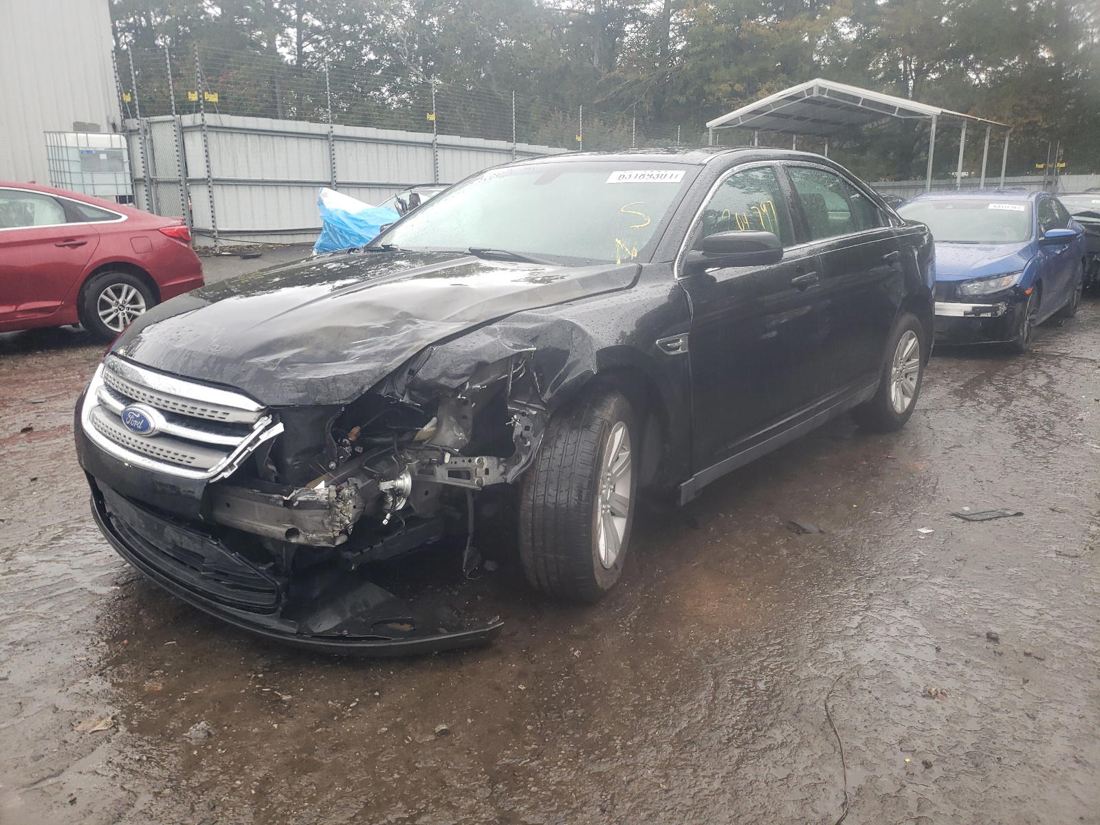 Photo 2 from auction – 2012 FORD TAURUS SE with VIN 1FAHP2DW7CG125717