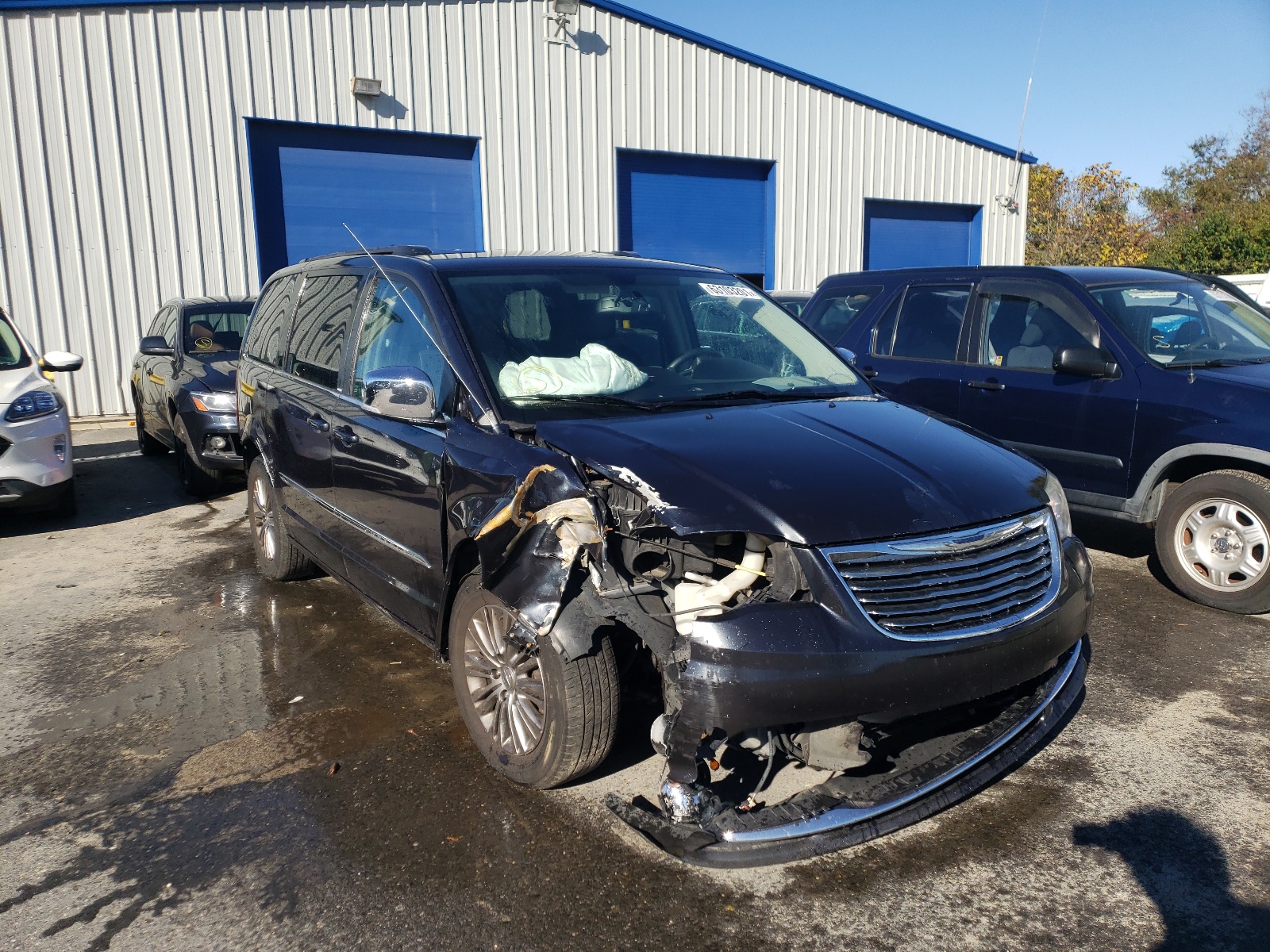CHRYSLER TOWN & COU 2014 with VIN 2C4RC1CG9ER277224 - Photo from auction