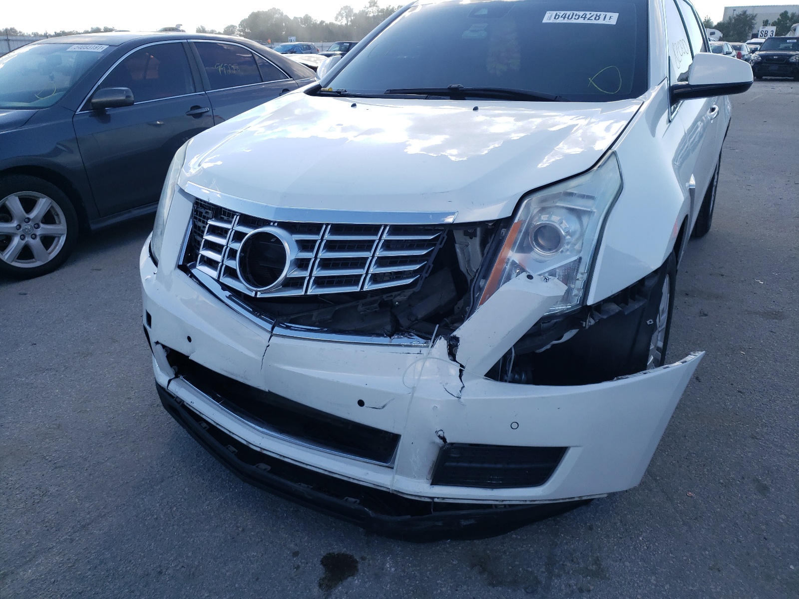 Photo 9 from auction – 2015 CADILLAC SRX LUXURY with VIN 3GYFNBE31FS561104