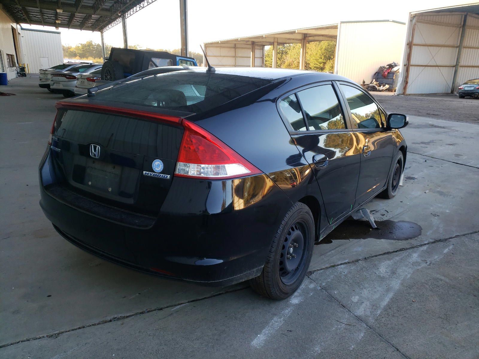 Photo 4 from auction – 2011 HONDA INSIGHT EX with VIN JHMZE2H72BS009763