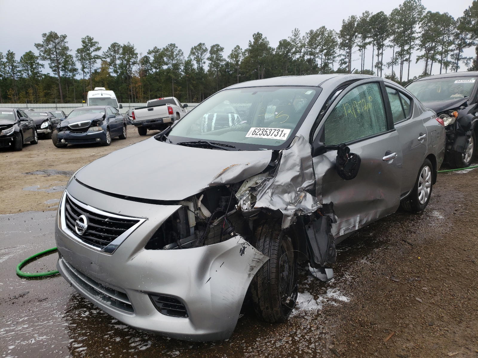 Photo 2 from auction – 2012 NISSAN VERSA S with VIN 3N1CN7AP4CL836374