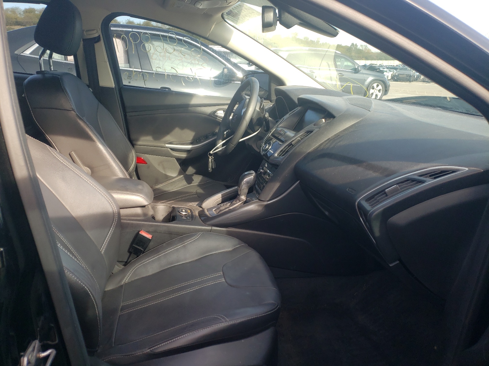 Photo 5 from auction – 2012 FORD FOCUS TITA with VIN 1FAHP3N24CL271548