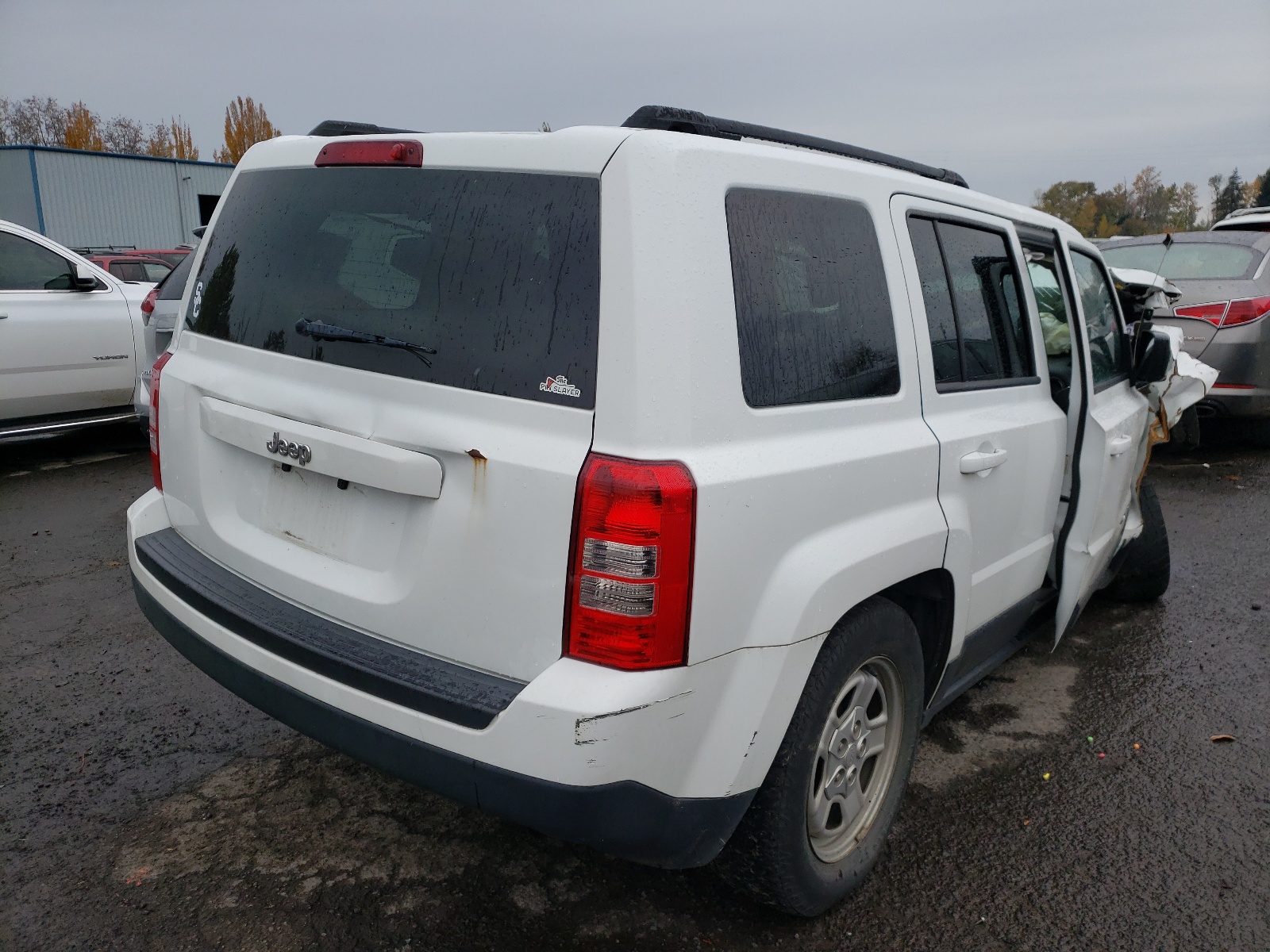 Photo 4 from auction – 2014 JEEP PATRIOT SP with VIN 1C4NJPBA8ED690758