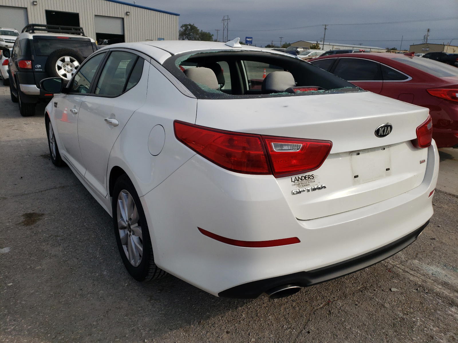Photo 3 from auction – 2015 KIA OPTIMA LX with VIN KNAGM4A70F5620684
