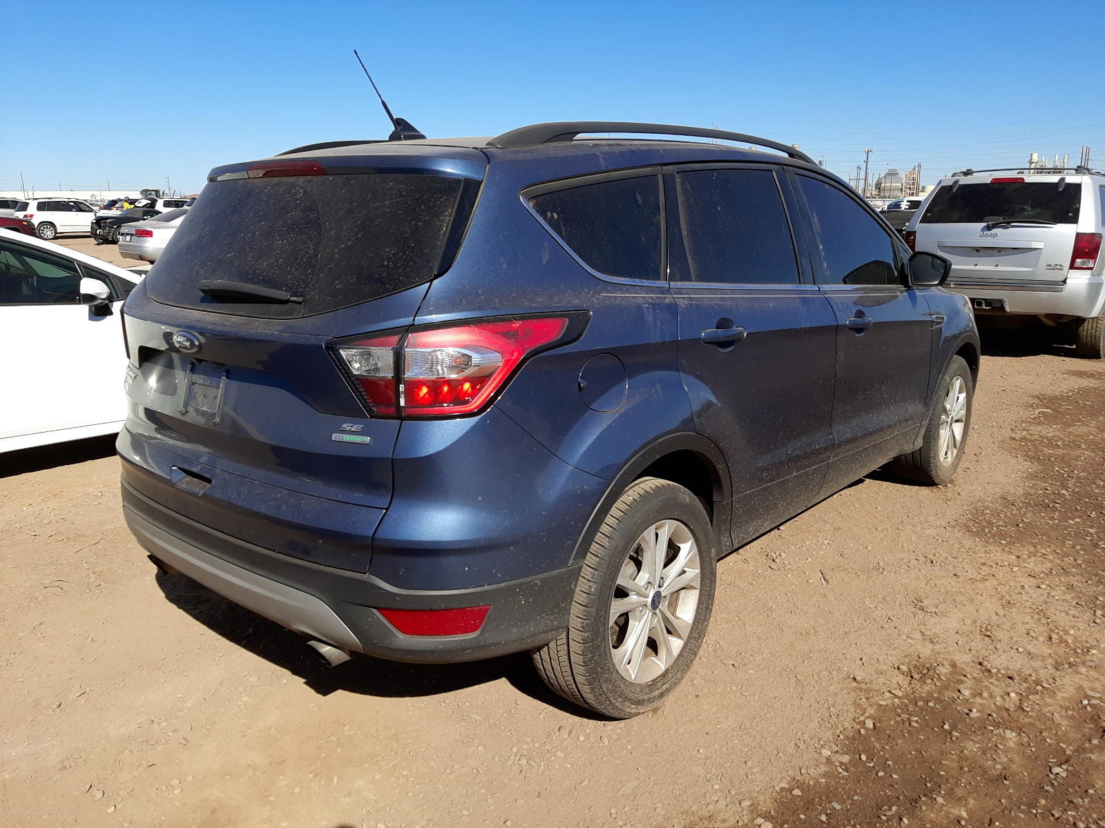 Photo 4 from auction – 2018 FORD ESCAPE SE with VIN 1FMCU0GD8JUB84331
