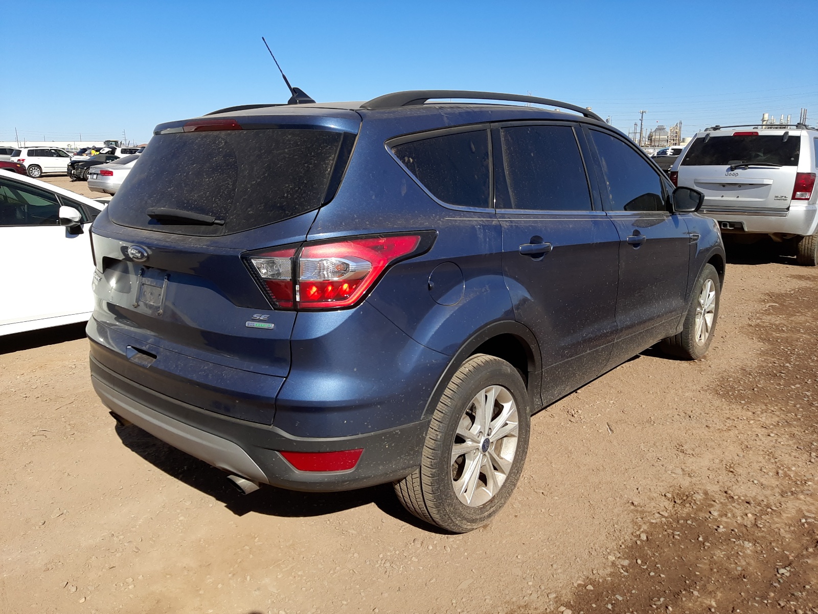 Фото 4 с аукциона – 2018 FORD ESCAPE SE с VIN 1FMCU0GD8JUB84331